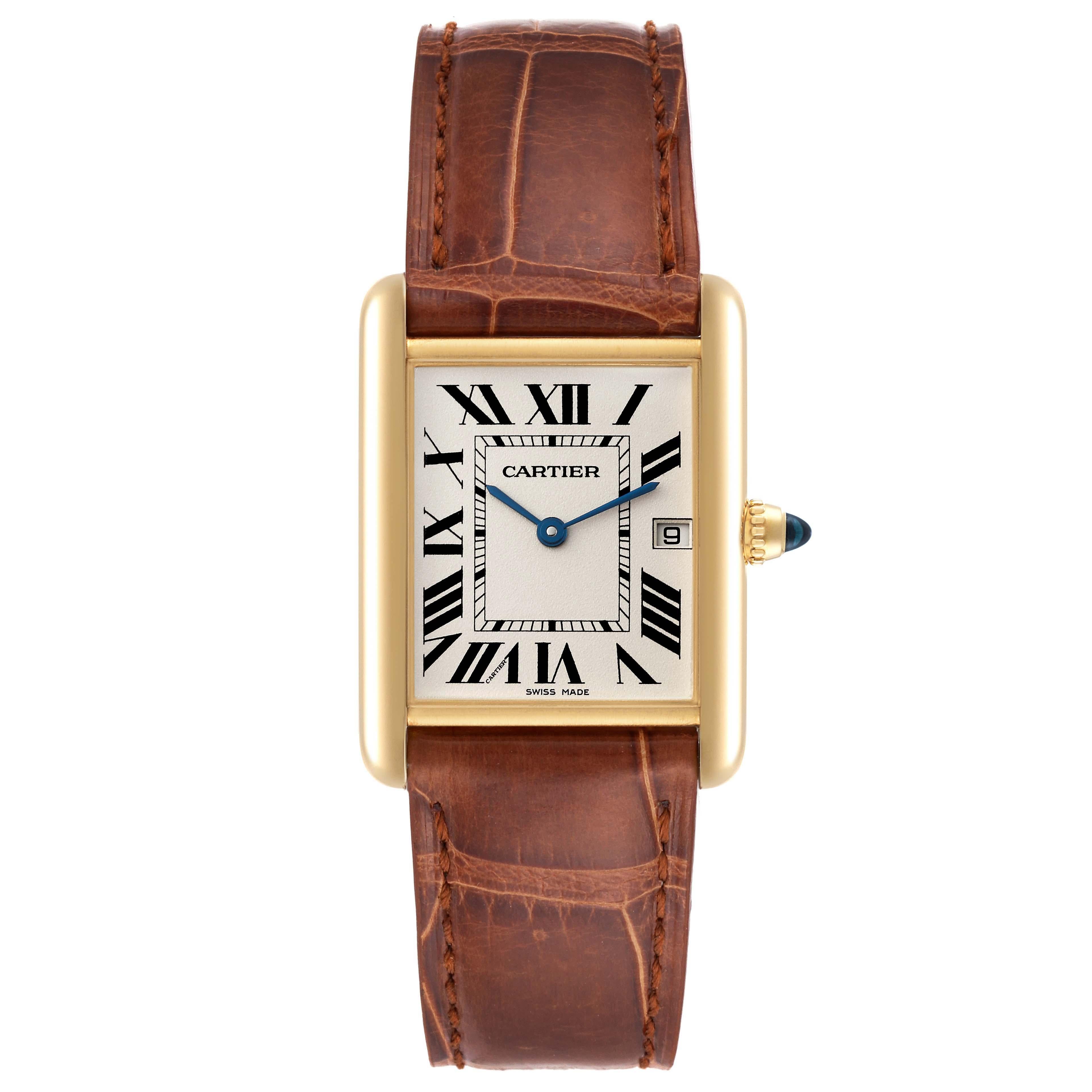 Cartier Tank Louis Yellow Gold Brown Leather Strap Mens Watch W1529756 Card. Quartz movement. 18k yellow gold case 25.0 x 33.0 mm. Circular grained crown set with a blue sapphire cabochon. . Mineral crystal. Silvered opaline dial with black Roman