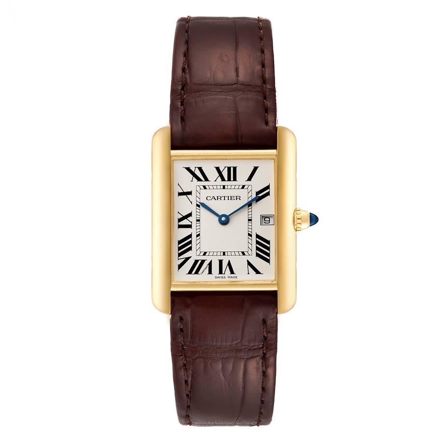 Cartier Tank Louis Gelbgold Braun Armband Herrenuhr W1529756. Quarzwerk. Gehäuse aus 18k Gelbgold 25,0 x 33,0 mm. Runde, gemaserte Krone, besetzt mit einem blauen Saphir-Cabochon. . Kratzfestes Saphirglas. Versilbertes Opalin-Zifferblatt. Schwarz