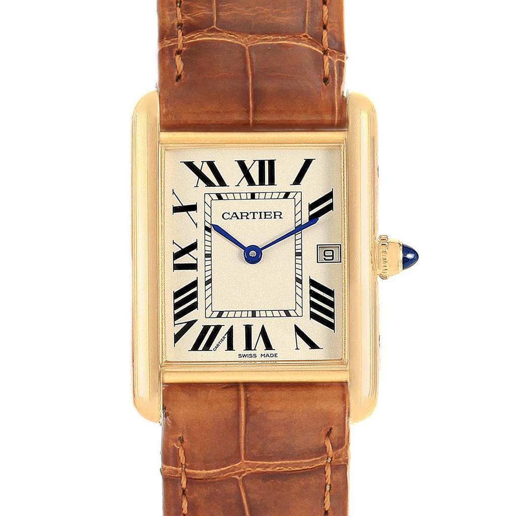 Cartier Tank Louis Yellow Gold Brown Strap Watch W1529756 Box Papers. Quartz movement. 18k yellow gold case 25.0 x 33.0 mm. Circular grained crown set with the blue sapphire cabochon. Scratch resistant sapphire crystal. Silvered grained dial.