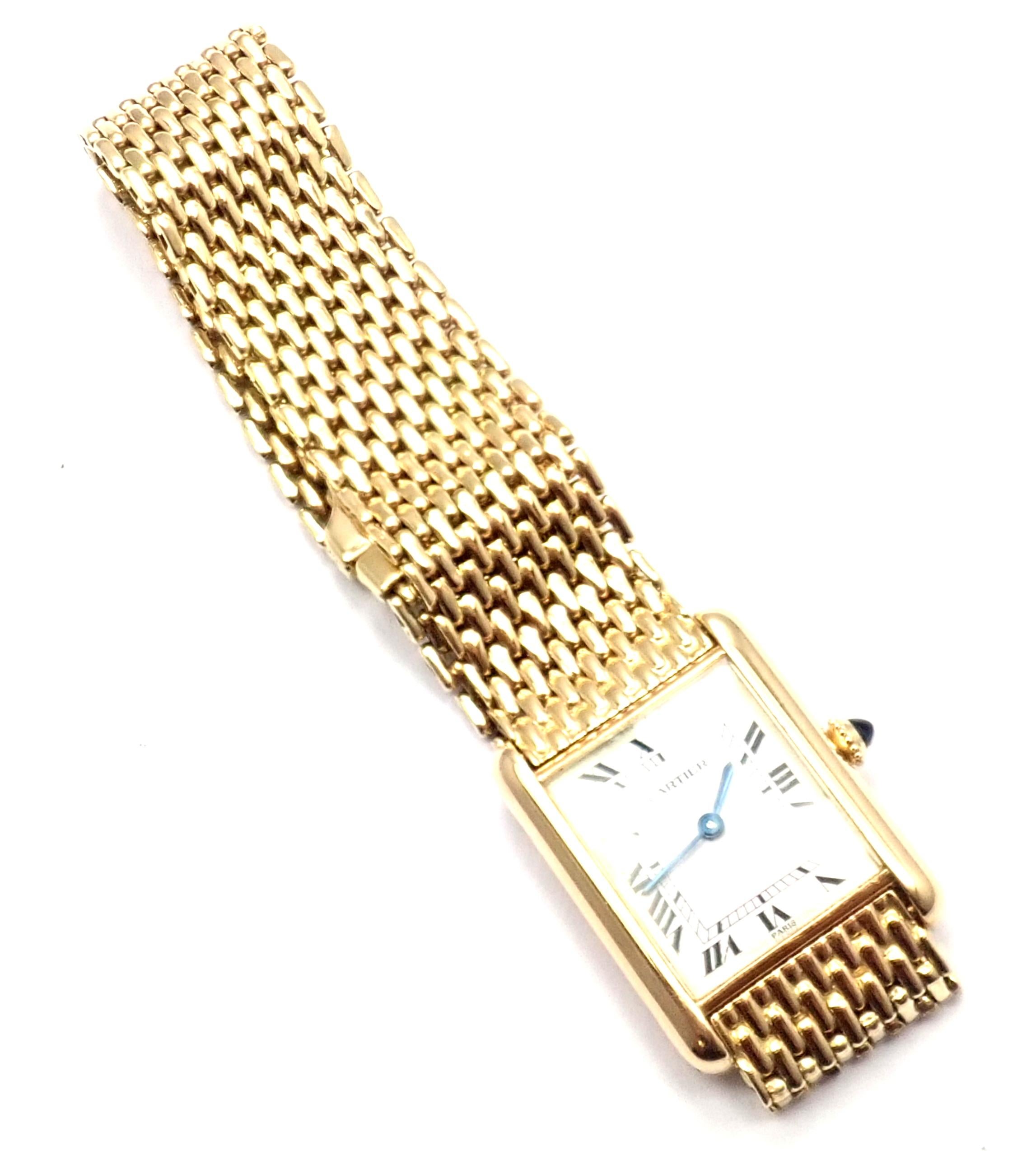 This gorgeous Cartier Tank Louis Large watch is made of 18k yellow gold and is in mint condition with a manual wide mechanical movement. This rectangular watch is part of Cartier's Tank collection. This watch also comes with an 18k yellow gold