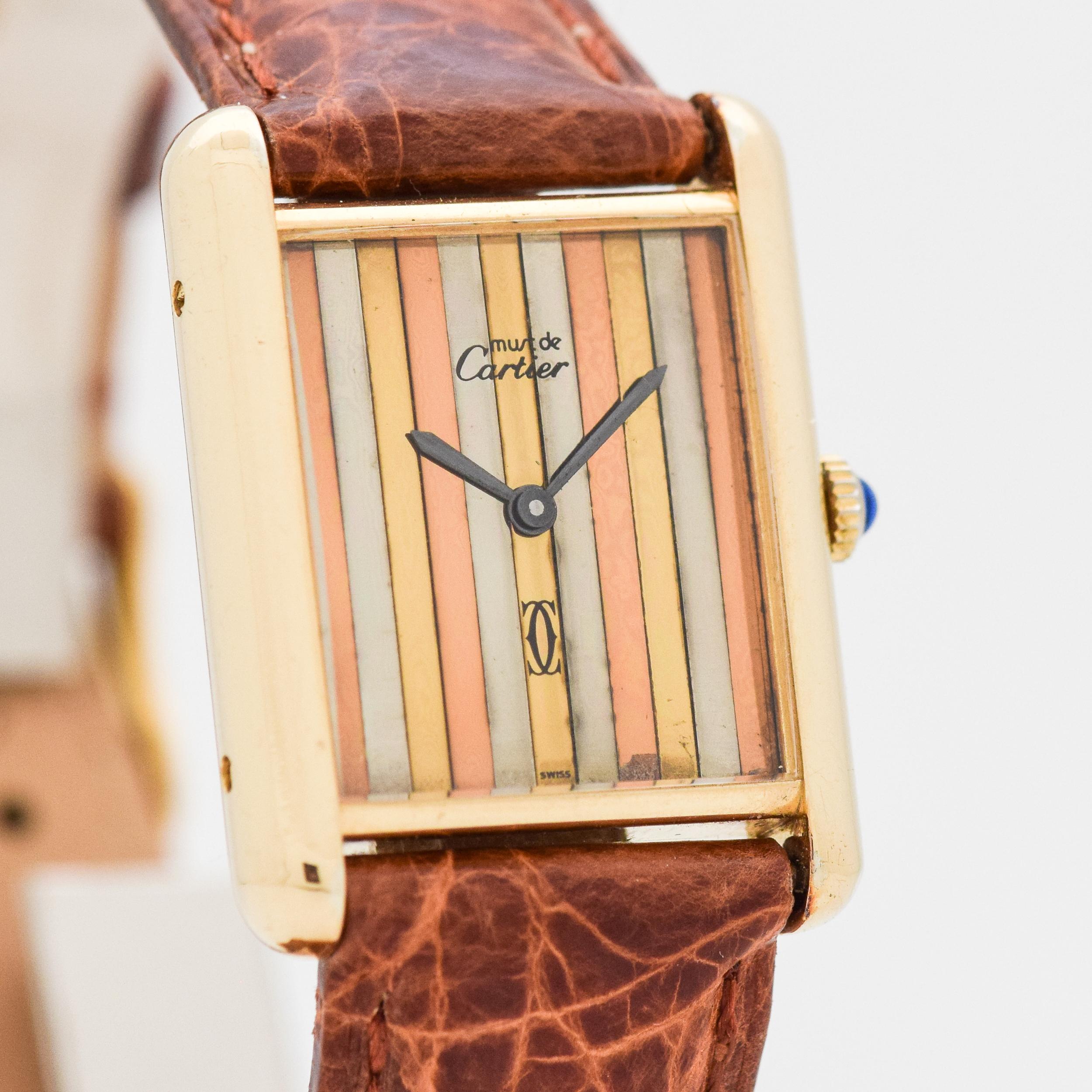 1990's Vintage Cartier Standard Men's Size Must de Cartier Tank 18k Yellow Gold Plated Over Sterling Silver watch wit Original Tri-Color (Rose, Yellow, Silver) Dial. Triple Singed. 23mm x 27mm lug to lug (0.91 in. x 1.06 in.) - 17 jewel, manual