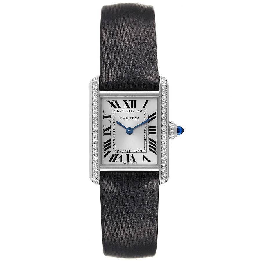 Cartier Tank Must Small Steel Diamond Bezel Ladies Watch W4TA0016 Box Card. Quartz movement. Stainless steel case 27 x 22 mm. Circular grained crown set with the blue spinel cabochon. Stainless steel bezel set with 40 Cartier factory original
