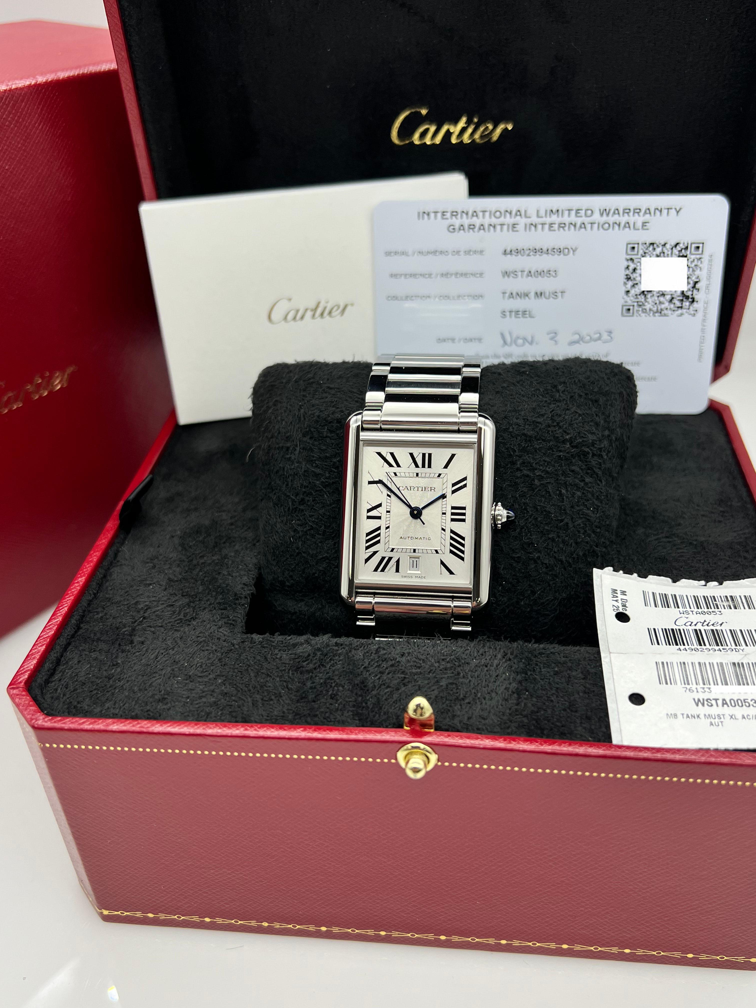 Style Number: Ref 4490 / WSTA0053
Year: 2023
Model: Cartier Tank Must XL
Case Material: Stainless Steel 
Band: Stainless Steel 
Bezel:  Stainless Steel 
Dial: Silver 
Face: Sapphire Crystal 
Case Size: 31mm x 41mm 
Includes: 
-Cartier Box &