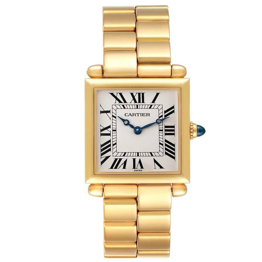 Cartier Tank Obus Prevee Collection 18k Yellow Gold Ladies Watch W15122N7. . 18k yellow gold square case 24.5 x 24.5 mm (31 mm with lugs). Rounded bullet lugs. Circular grained crown set with the sapphire cabochon. . Scratch resistant sapphire