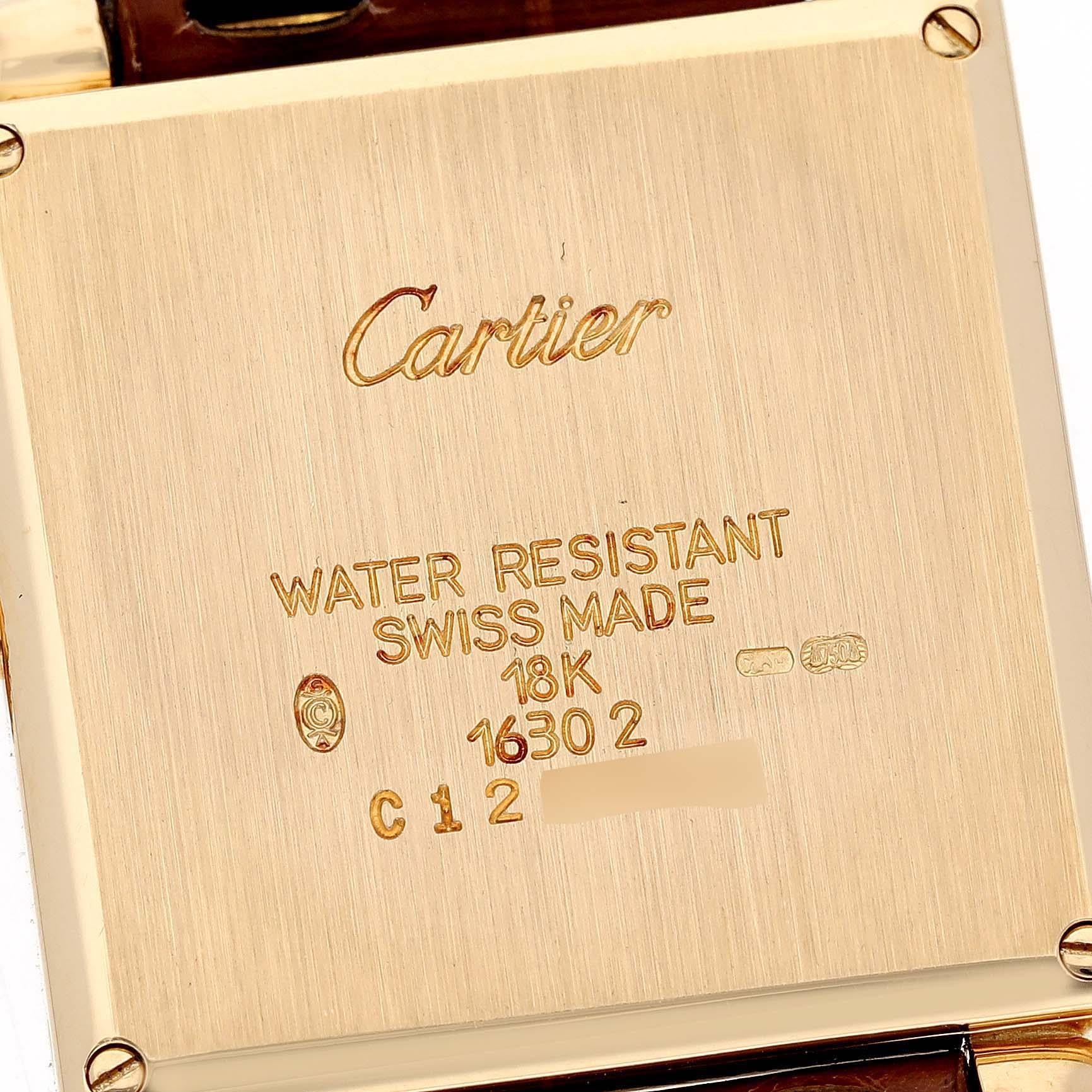 Cartier Tank Obus Yellow Gold Brown Strap Ladies Watch W1512256. Quartz movement. 18k yellow gold square case 24.5 x 24.5 mm (31 mm with lugs). Rounded bullet lugs. Circular grained crown set with a blue sapphire cabochon.. . Mineral glass crystal.
