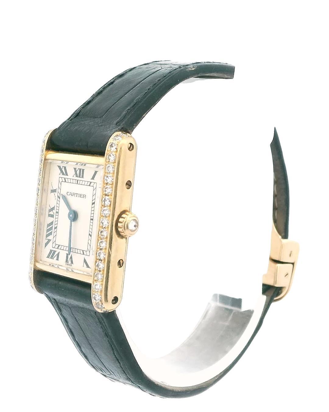 Cartier Tank Paris Ladies Watch is an elegant timepiece that exemplifies luxury and sophistication. The watch features a 21mm case made of 18K yellow gold, beautifully complemented by factory-set diamonds that add a touch of sparkle. The ivory dial
