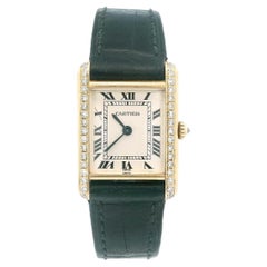 Cartier: 18 Karat Gelbgold Damenuhr Tank Paris mit Diamanten