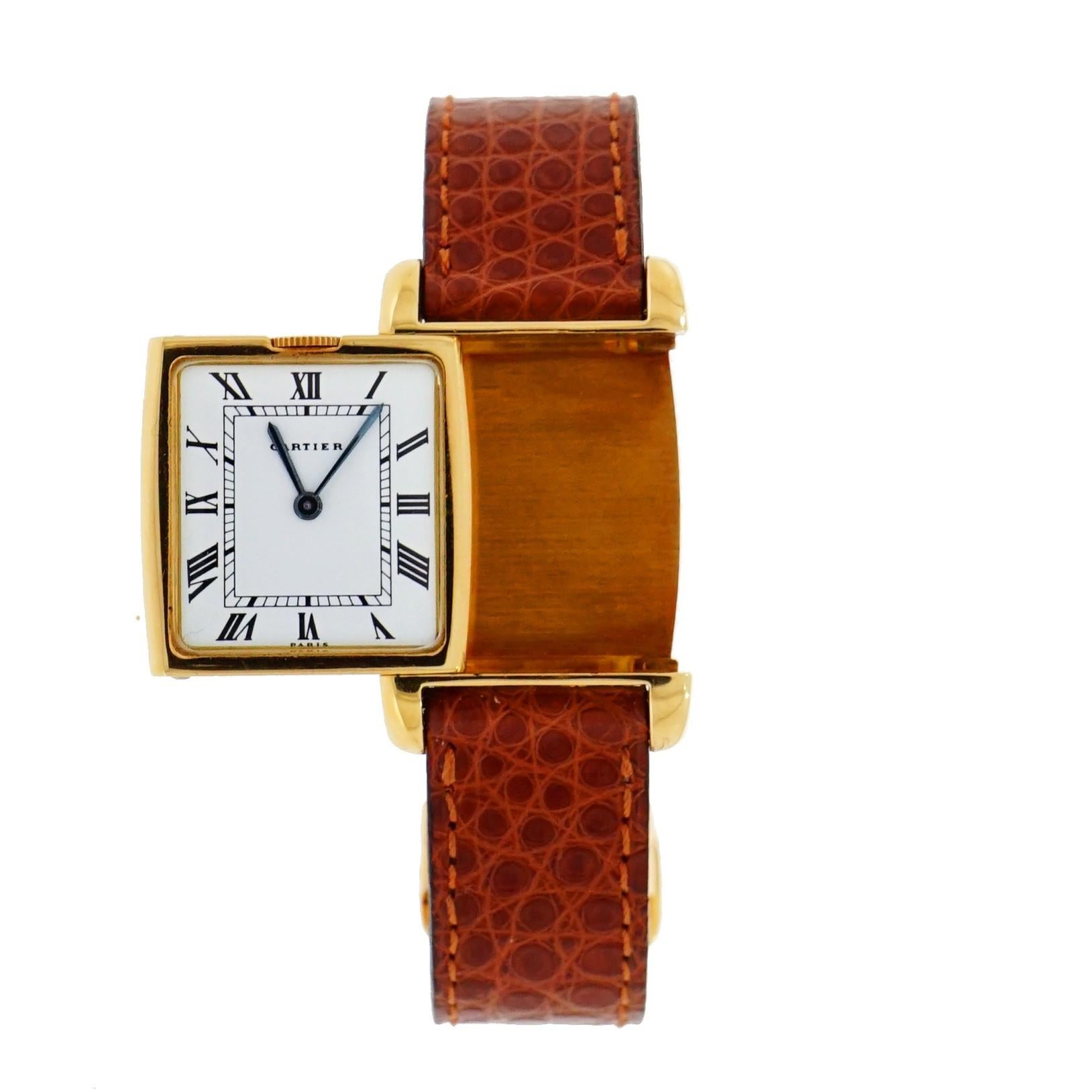 Pre-owned in very good condition Vintage Cartier Reverso Dual time, beautiful halfmoon lugs, one side has a white dial with roman numeral hour markers, the other side has a champagne dial with black roman numerals, the  crown is hidden on the top