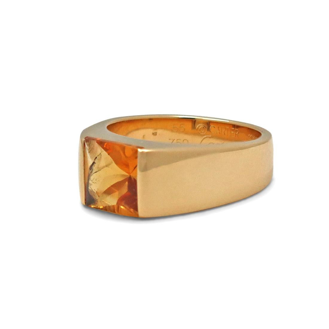 Authentic Cartier 'Tank' ring crafted in 18 karat yellow gold centering on a square-shaped citrine stone measuring approximately 8mm. Signed Cartier, 750, 1997, 53, with serial number and hallmark. Ring size 53 EU, 7 1/4 US. The ring is presented