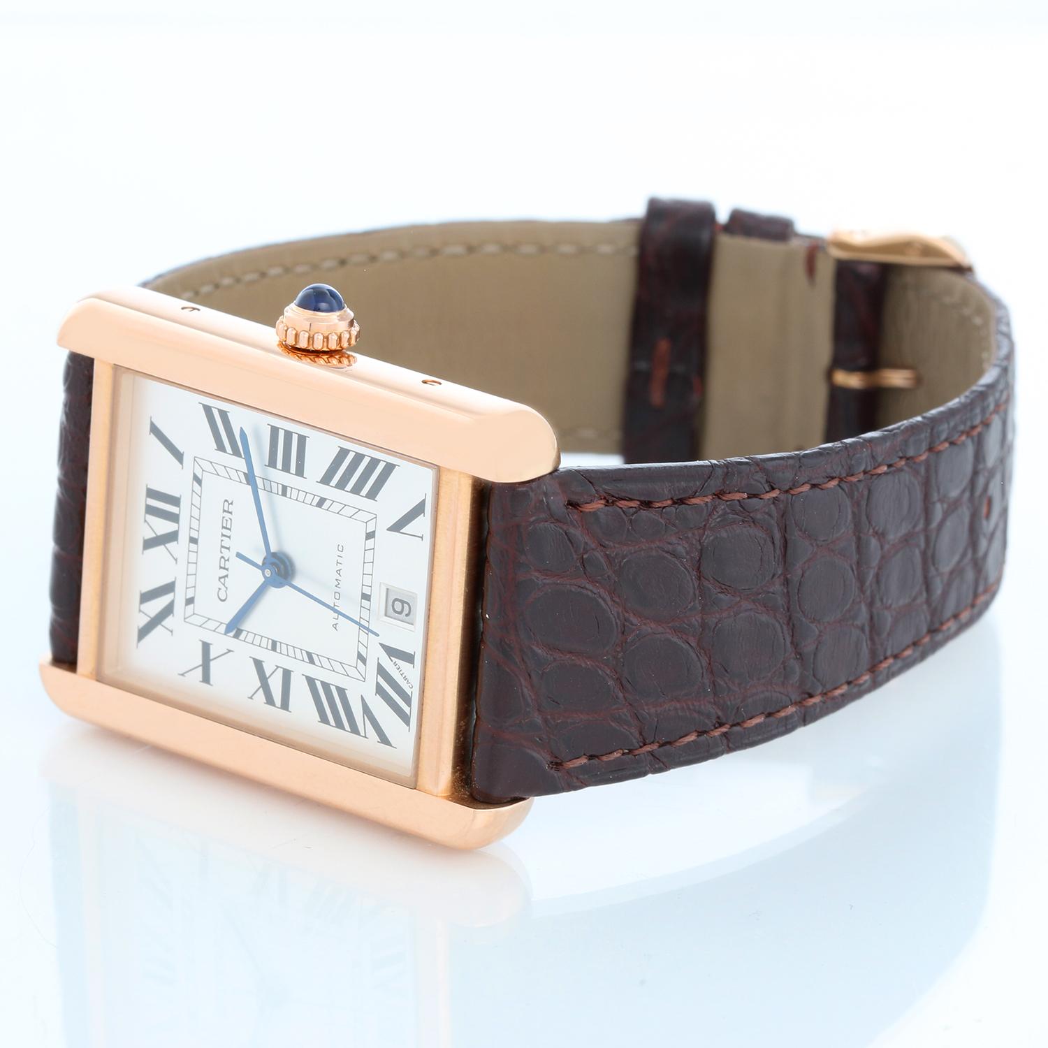 Cartier Tank Solo 18k Rose Gold & Stainless Steel XL W5200026 3514 - Automatic . 18k rose gold case with stainless steel back  (31 x 41mm). Silver dial with black Roman numerals with date at 6 o'clock. Brown Cartier strap with Cartier rose gold tang