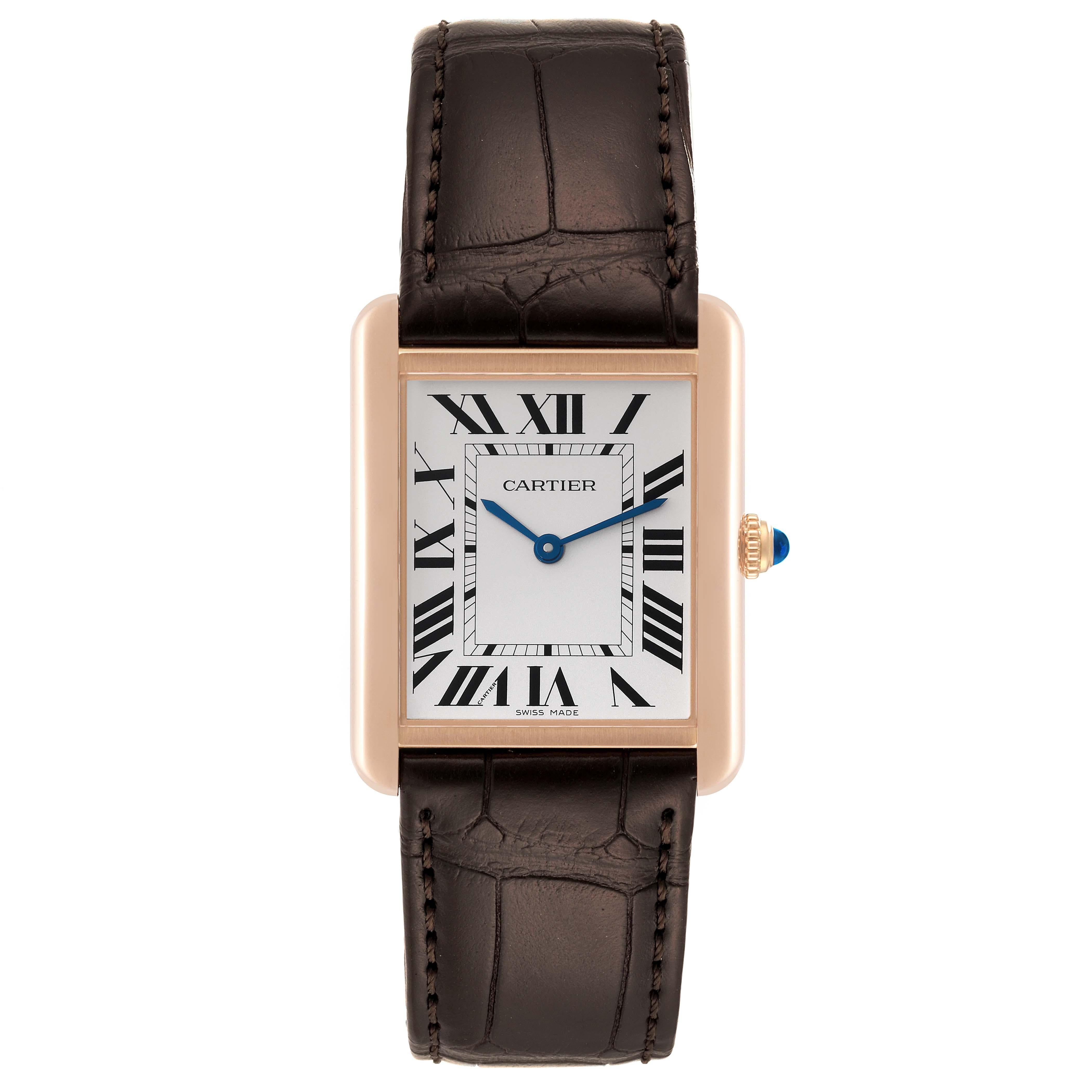Cartier Tank Solo Large Rose Gold Steel Brown Strap Mens Watch W5200025 Card. Quartz movement. 18k rose gold case 34.0 x 27.0 mm. Stainless steel caseback. Circular grained crown set with a blue spinel cabochon. . Scratch resistant sapphire crystal.