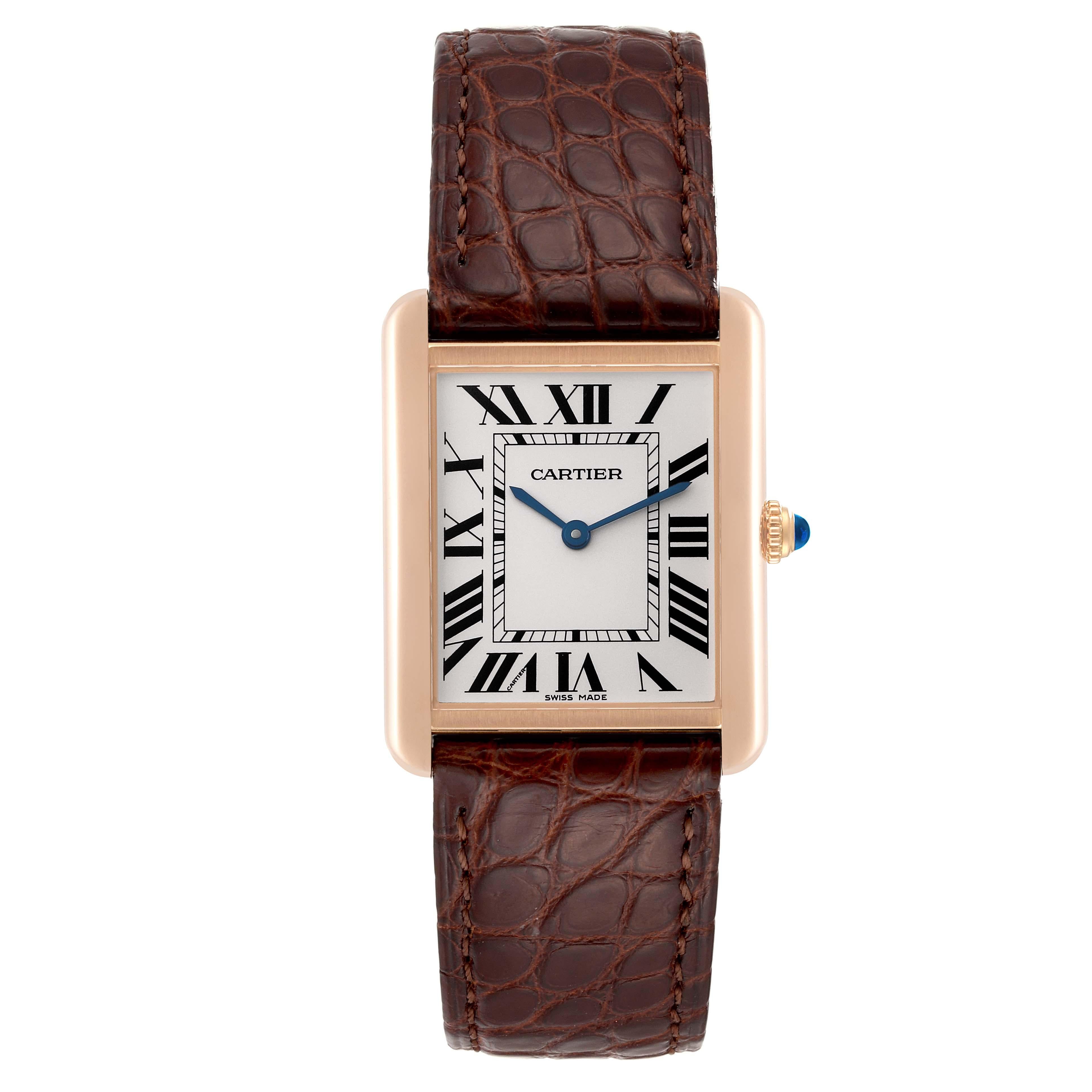 Cartier Tank Solo Large Rose Gold Steel Brown Strap Mens Watch W5200025 Card. Quartz movement. 18k rose gold case 34.0 x 27.0 mm. Stainless steel caseback. Circular grained crown set with a blue spinel cabochon. . Scratch resistant sapphire crystal.