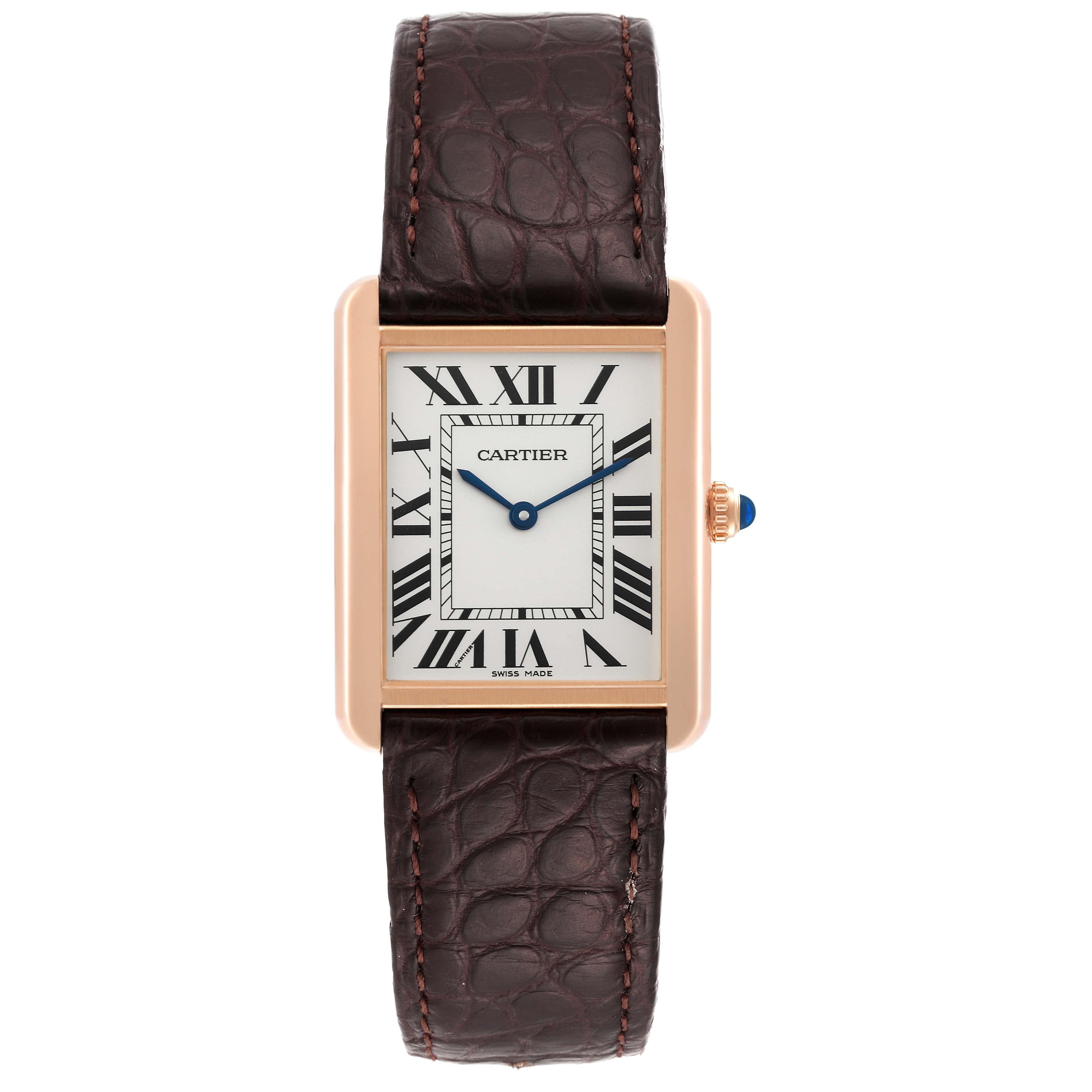 Cartier Tank Solo Large Rose Gold Steel Brown Strap Mens Watch W5200025. Quartz movement. 18k rose gold case 34.0 x 27.0 mm. Stainless steel case back. Circular grained crown set with a blue spinel cabochon. . Scratch resistant sapphire crystal.