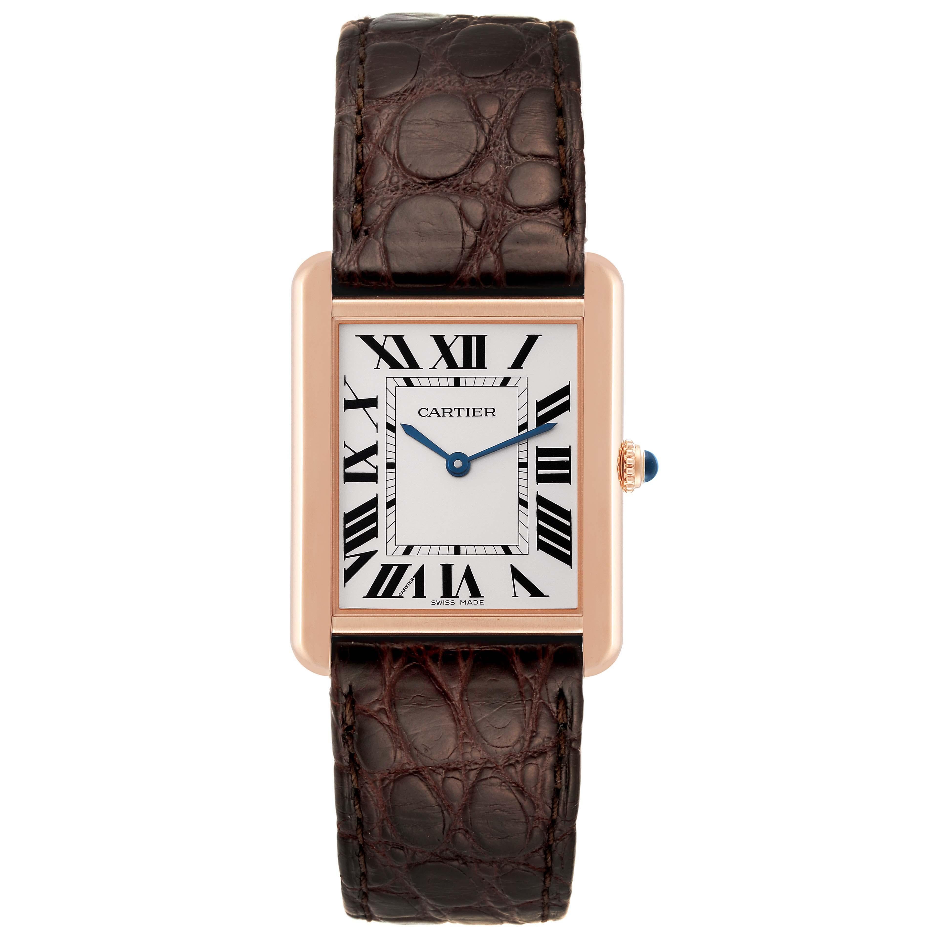Cartier Tank Solo Large Rose Gold Steel Brown Strap Mens Watch W5200025. Quartz movement. 18k rose gold case 34.0 x 27.0 mm. Stainless steel caseback. Circular grained crown set with a blue spinel cabochon. . Scratch resistant sapphire crystal.