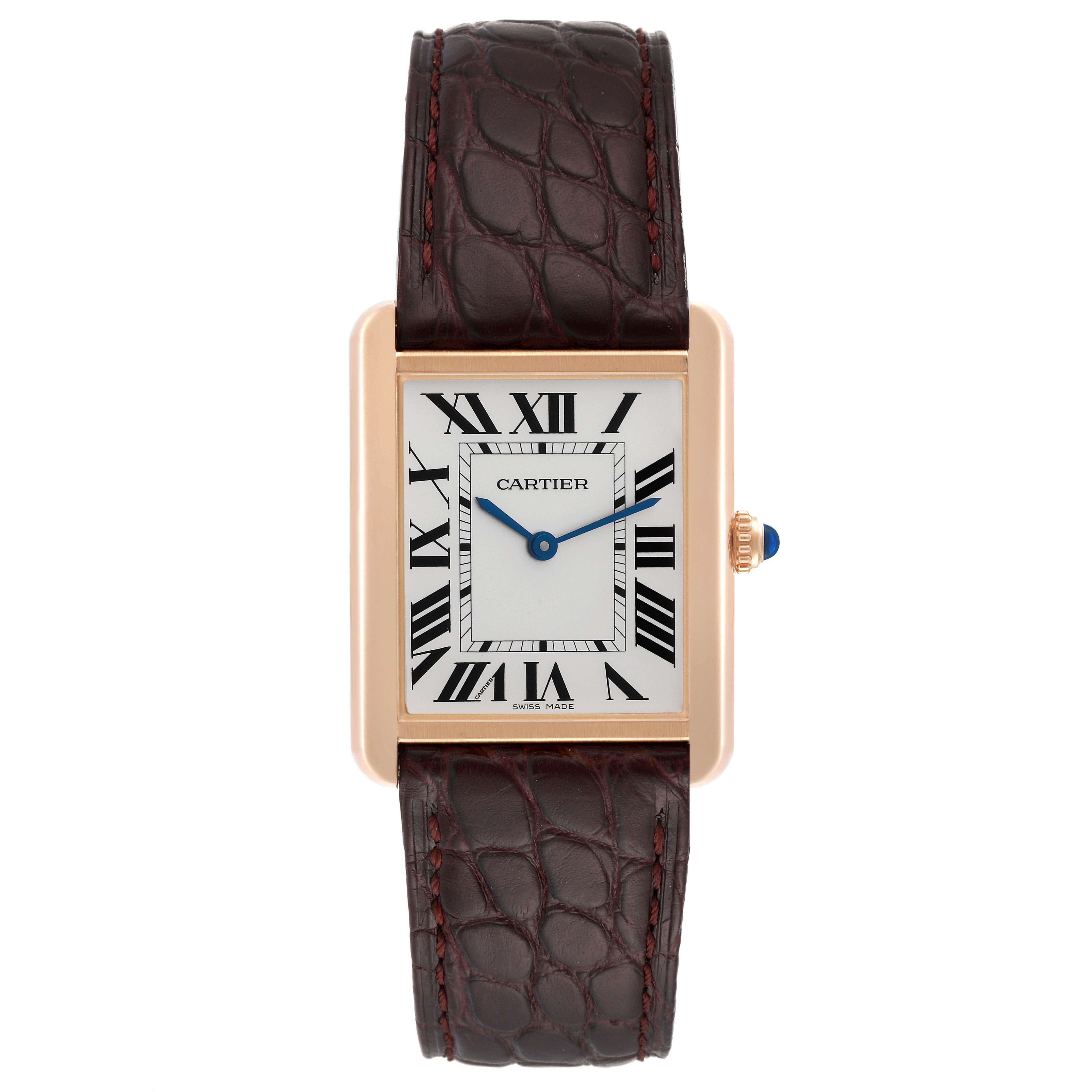 Cartier Tank Solo Large Rose Gold Steel Brown Strap Mens Watch W5200025 Papers. Quartz movement. 18k rose gold case 34.0 x 27.0 mm. Stainless steel caseback. Circular grained crown set with a blue spinel cabochon. . Scratch resistant sapphire