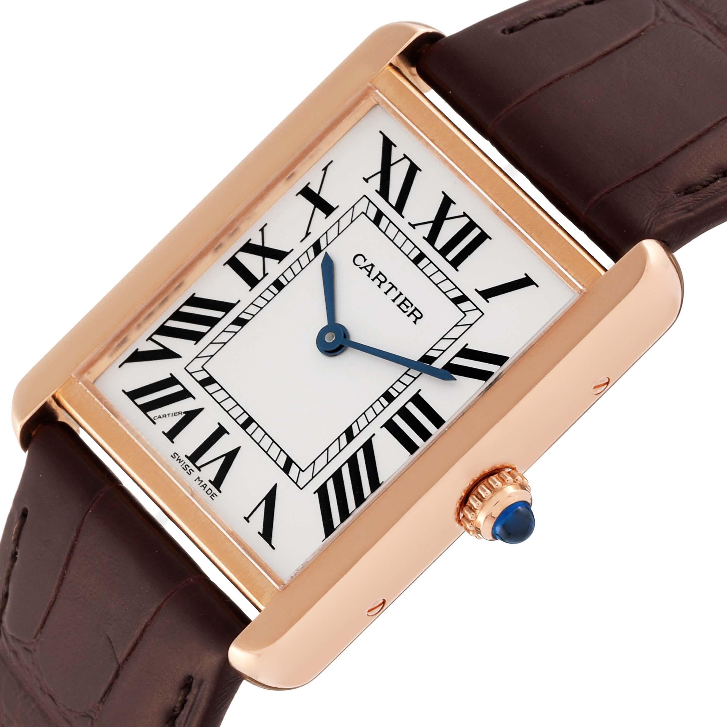 Cartier Tank Solo Large Rose Gold Steel Mens Watch W5200025 Card. Quartz movement. 18k rose gold case 34.0 x 27.0 mm. Stainless steel caseback. Circular grained crown set with a blue spinel cabochon. . Scratch resistant sapphire crystal. Silvered