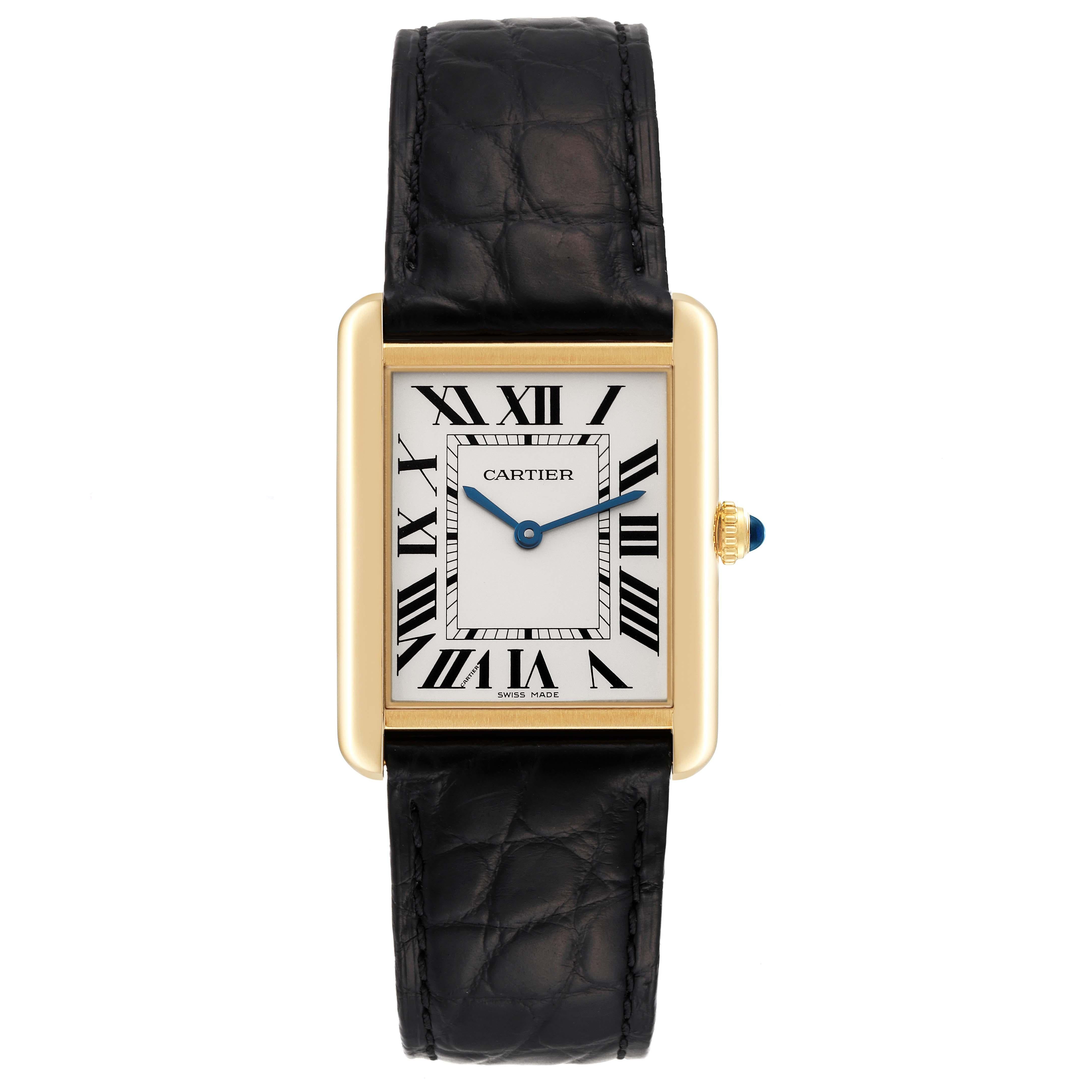 Cartier Tank Solo Large Yellow Gold Steel Mens Watch W5200004. Quartz movement. 18k yellow gold case 34 mm x 27 mm. Stainless steel case back. Circular grained crown set with a blue spinel cabochon. . Scratch resistant sapphire crystal. Silver