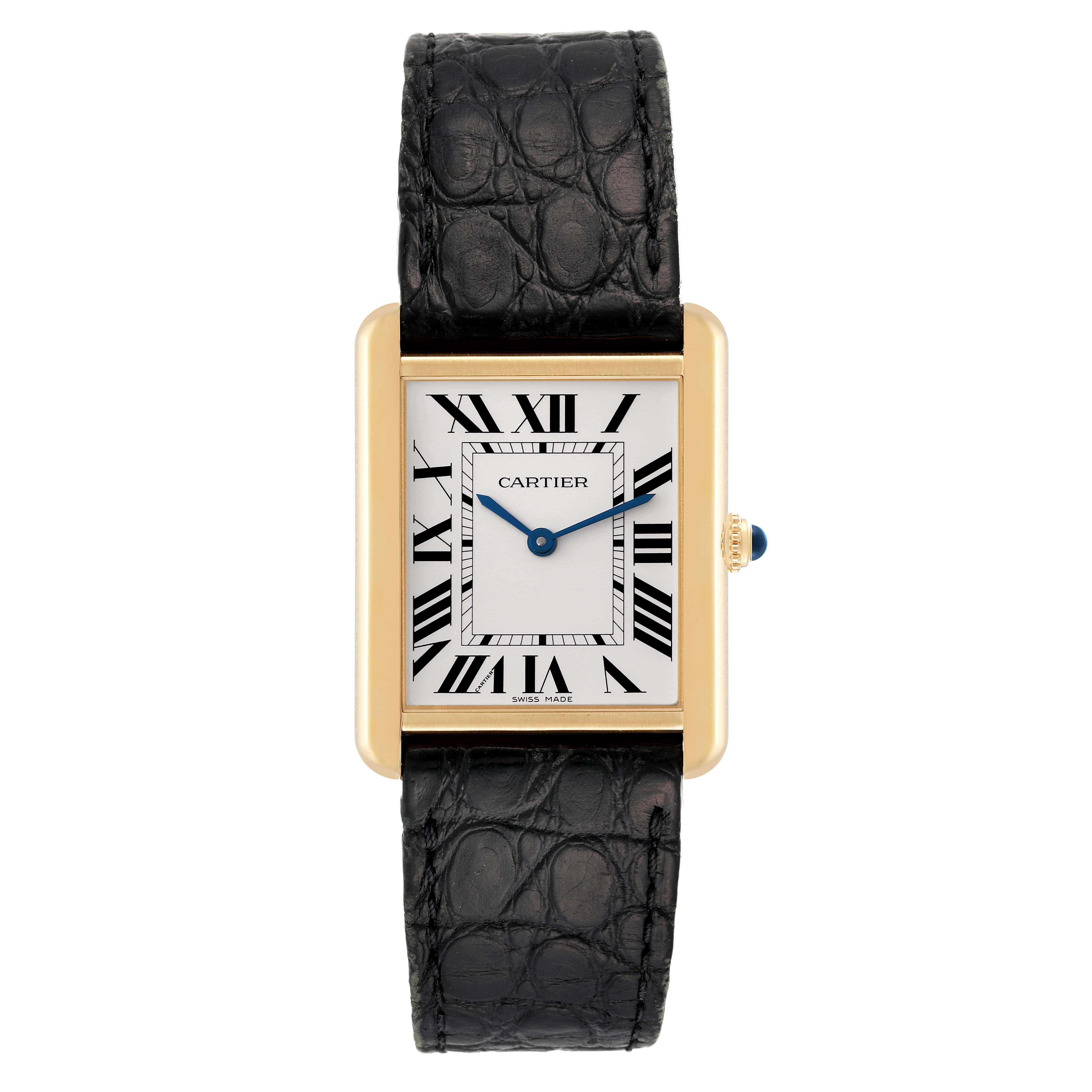 Cartier Tank Solo Large Yellow Gold Steel Mens Watch W5200004 Papers. Quartz movement. 18k yellow gold case 34 mm x 27 mm. Stainless steel case back. Circular grained crown set with a blue spinel cabochon. . Scratch resistant sapphire crystal.