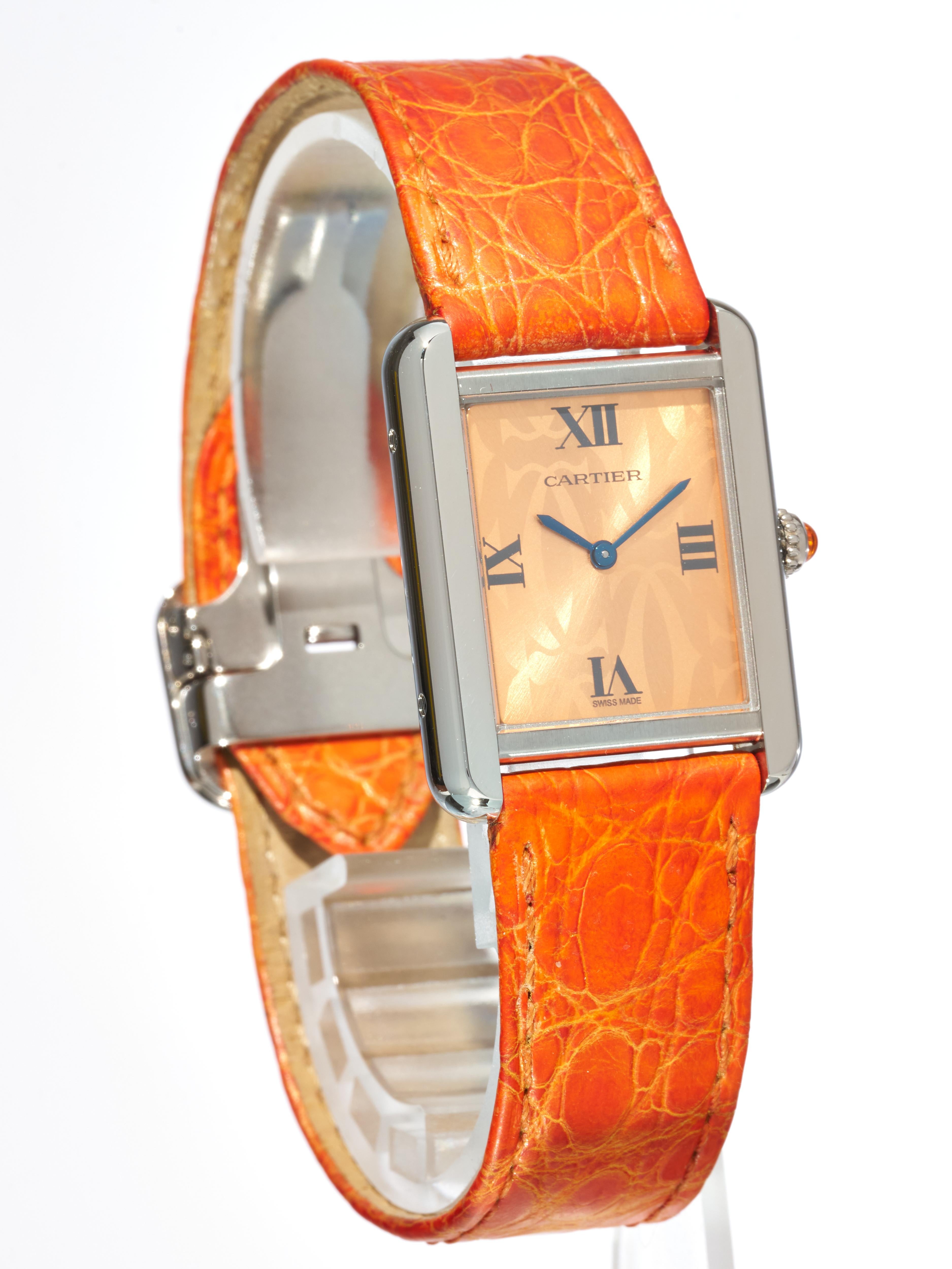 Fork In Time is proud to offer on the 1st Dibs marketplace:


Cartier 
Must De Tank
Stainless Steel 
Orange Cartier Logo Sunburst Dial from a special edition circa 2008

Reference 2716 

Swiss Made Marking at 6pm
24mm Case Width [28mm with