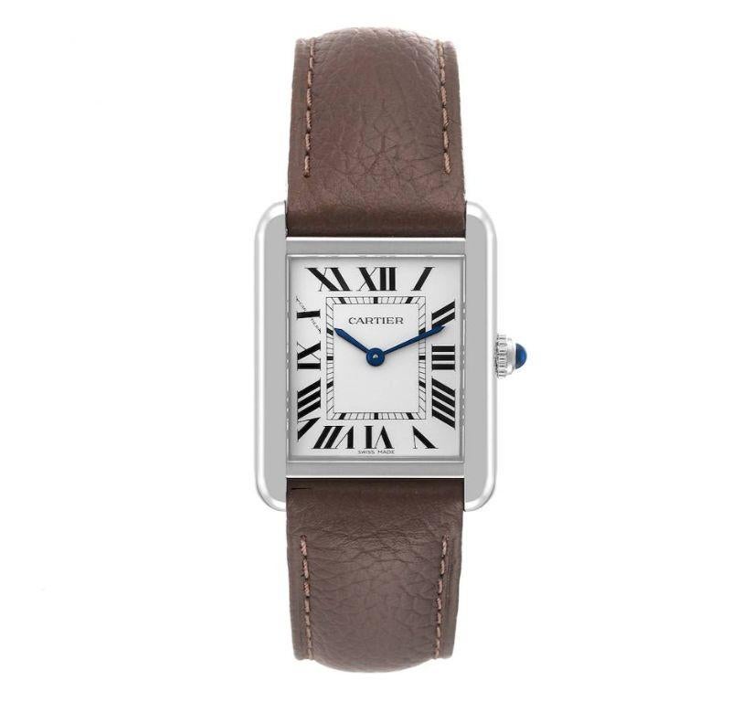 Cartier Tank Solo Small Steel Light Brown Strap Quartz Ladies Watch W1018255. Quartz movement. Stainless steel case 30.0 x 23.0 mm. Circular grained crown set with a blue spinel cabochon. . Scratch resistant sapphire crystal. Silver opaline dial.