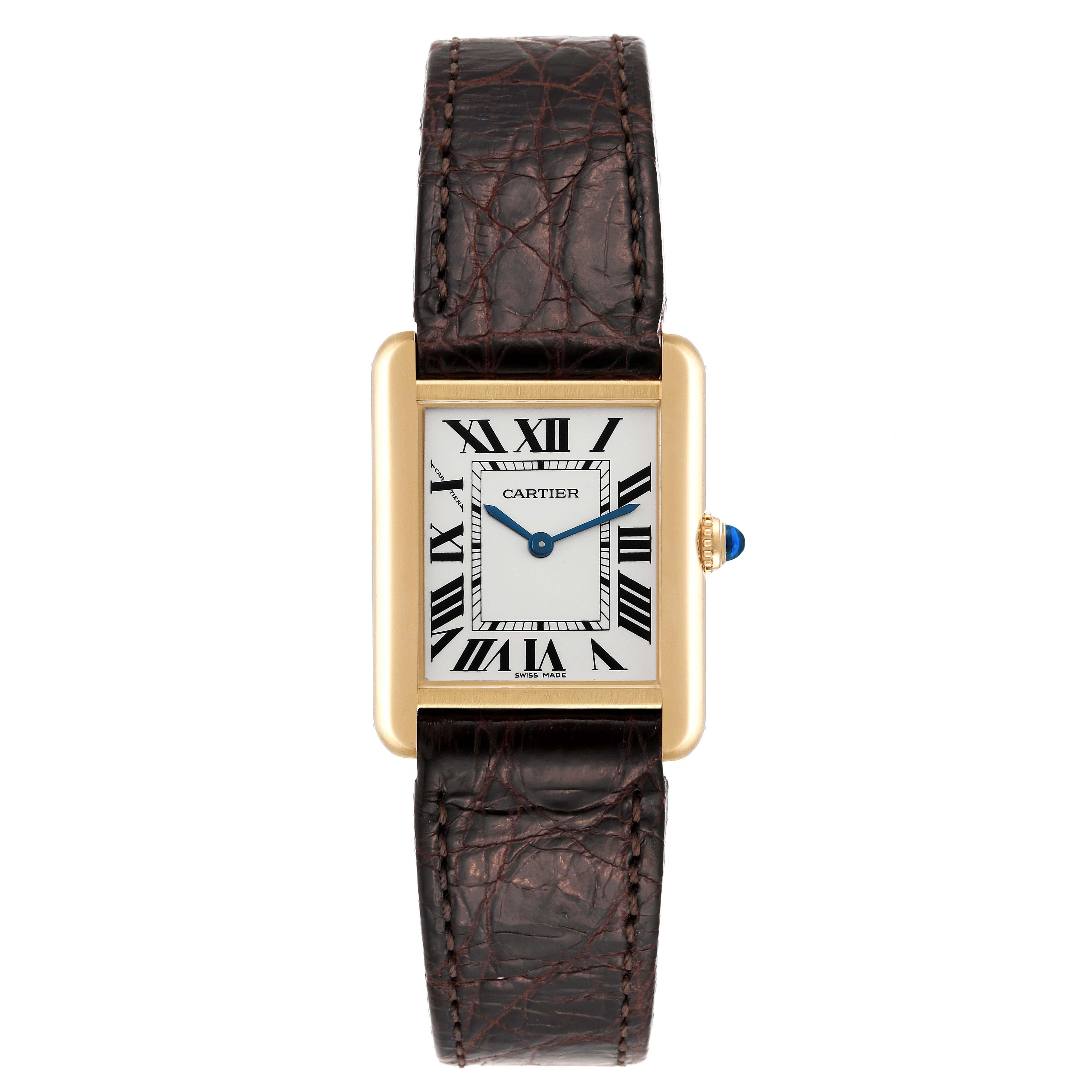 Cartier Tank Solo Small Yellow Gold Steel Silver Dial Ladies Watch W1018755. Quartz movement. 18k yellow gold case 30.0 x 23.0 mm. Stainless steel case back. Circular grained crown set with a blue spinel cabochon. . Scratch resistant sapphire