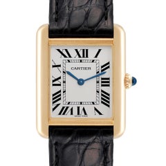 Cartier, petite montre Tank Solo en or jaune avec cadran en acier et argent, pour femmes W1018755