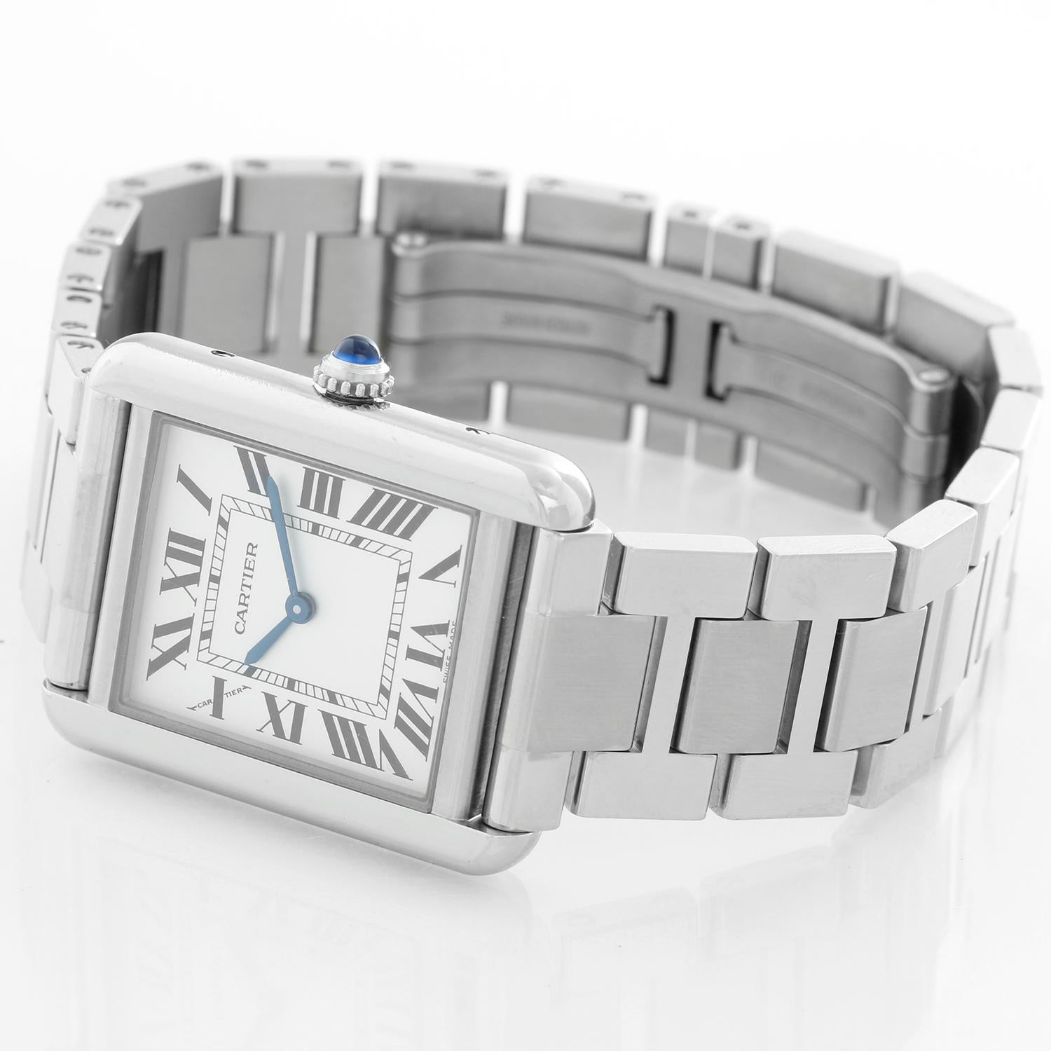 Cartier Tank Solo Stainless Steel Ladies Watch W5200013 3170 - Quartz. Stainless steel case (24mm x 30mm). Silver dial with black Roman numerals. Stainless steel Cartier Tank solo bracelet. Pre-owned with custom box.