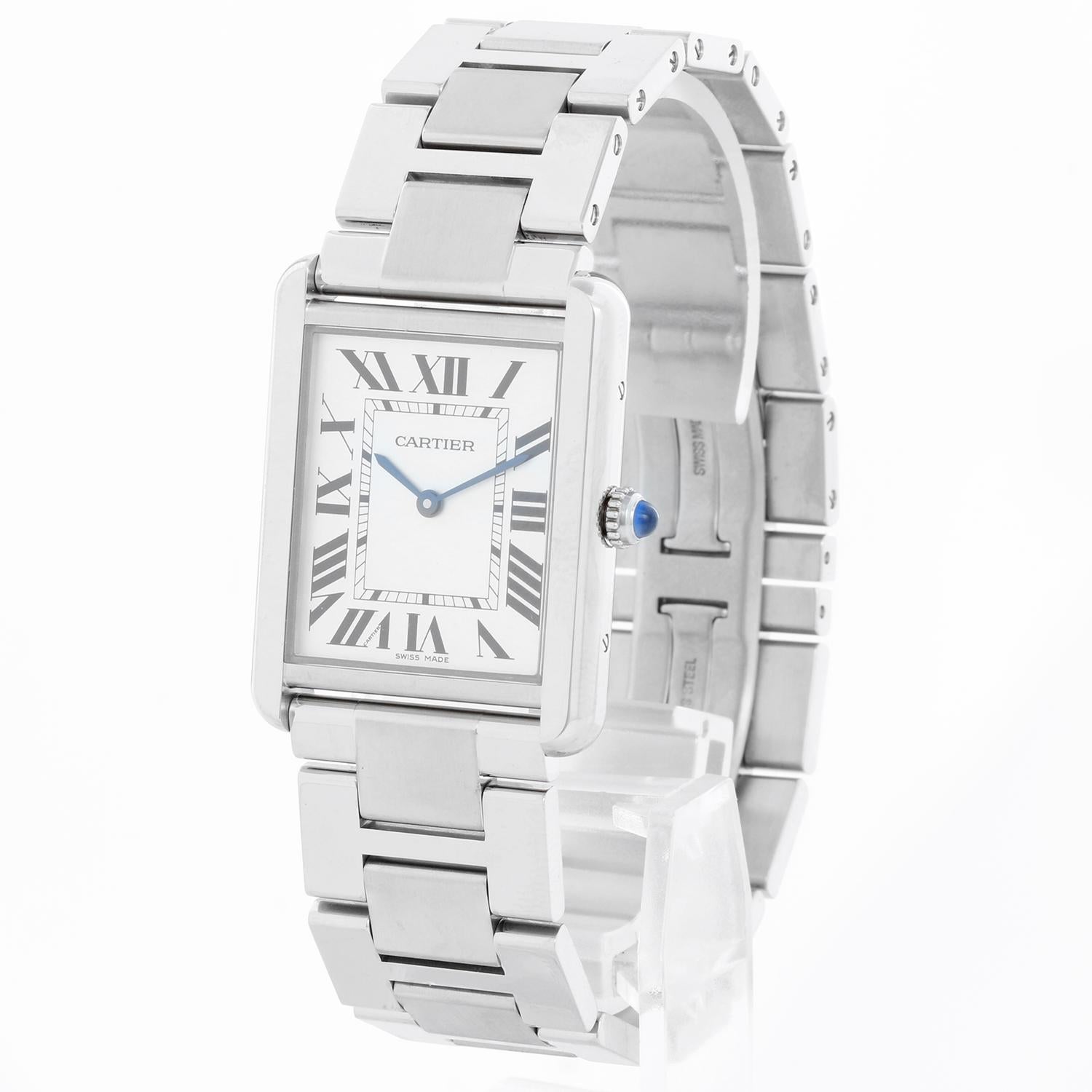 Cartier Tank Solo Stainless Steel W5200014 3169 - Quartz. Stainless steel  (27 x 34mm). Silver dial with black Roman numerals. Stainless Steel Cartier bracelet; fit 7 1/2