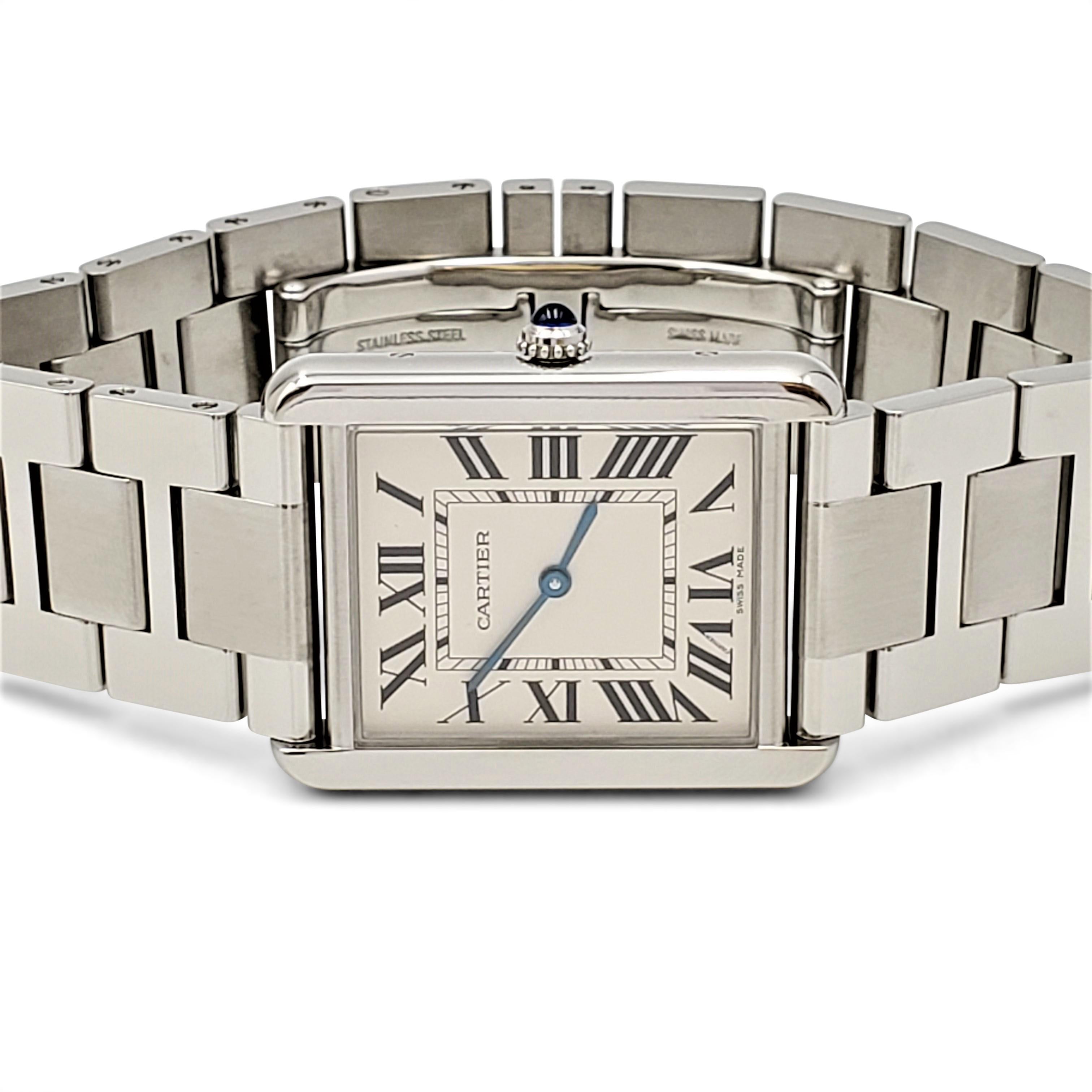 Authentic Cartier 'Tank Solo' watch crafted in stainless steel featuring a sleek rectangular case measuring 34.8 mm x 27.4 mm. The silvered opaline dial is completed with Roman numerals, blued-steel sword-shaped hands, and a sapphire crystal. Secret