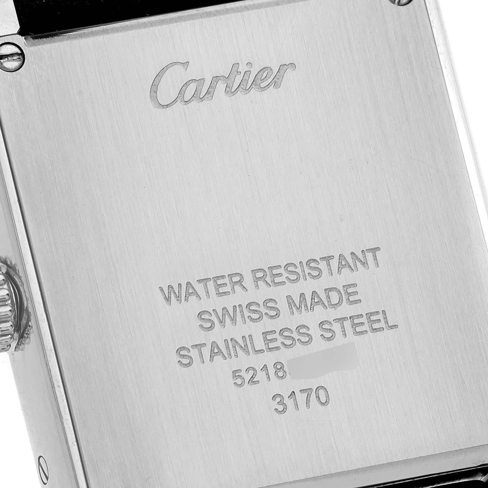 Cartier Tank Solo Steel Black Strap Ladies Watch W5200005. Quartz movement. Stainless steel case 30.0 x 23.0 mm. Circular grained crown set with the blue spinel cabochon. . Scratch resistant sapphire crystal. Silver opaline dial. Black Roman