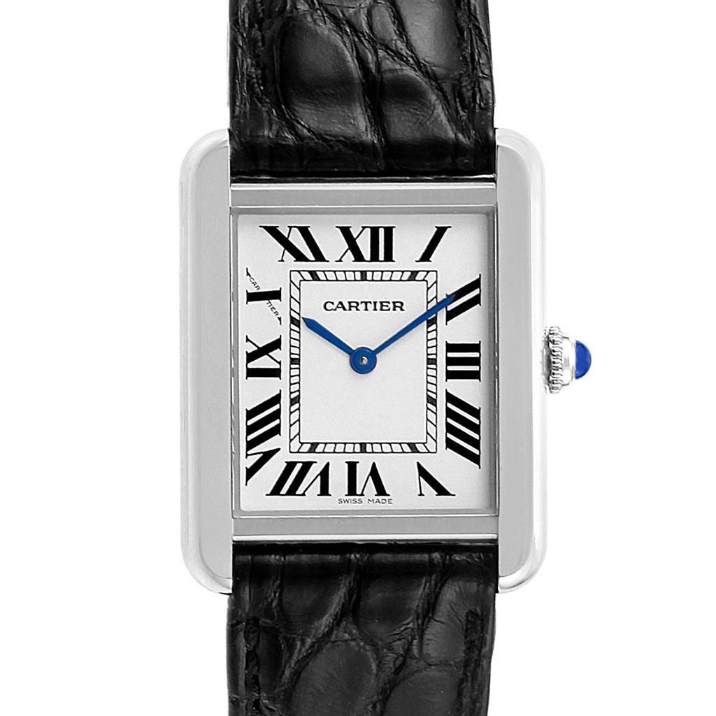 Cartier Tank Solo Steel Black Strap Quartz Ladies Watch W1018255. Quartz movement. Stainless steel case 30.0 x 23.0 mm. Circular grained crown set with the blue spinel cabochon. Scratch resistant sapphire crystal. Silver opaline dial. Painted black