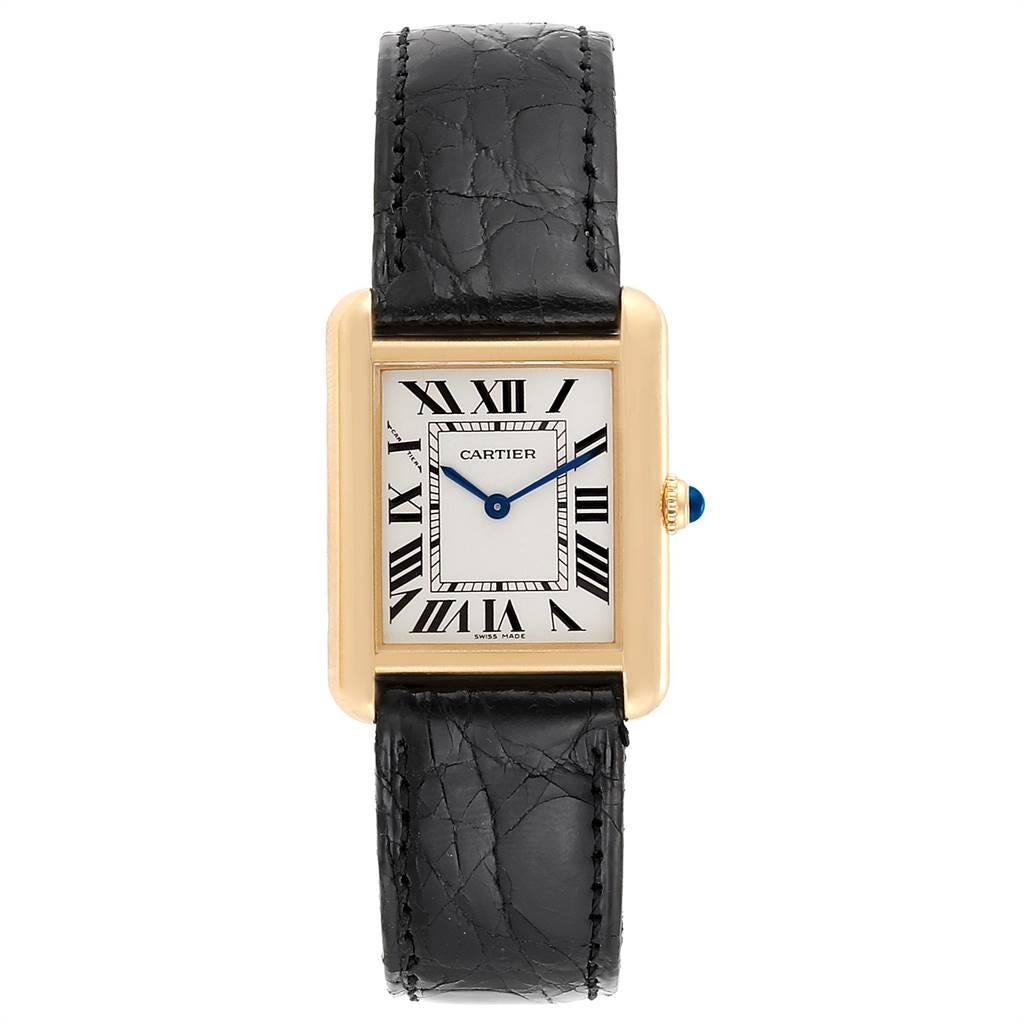 Cartier Tank Solo Yellow Gold Steel Black Strap Ladies Watch W1018755. Quartz movement. 18k yellow gold and steel back case 30.0 x 23.0 mm. Circular grained crown set with the blue spinel cabochon. 18k yellow gold bezel. Scratch resistant sapphire