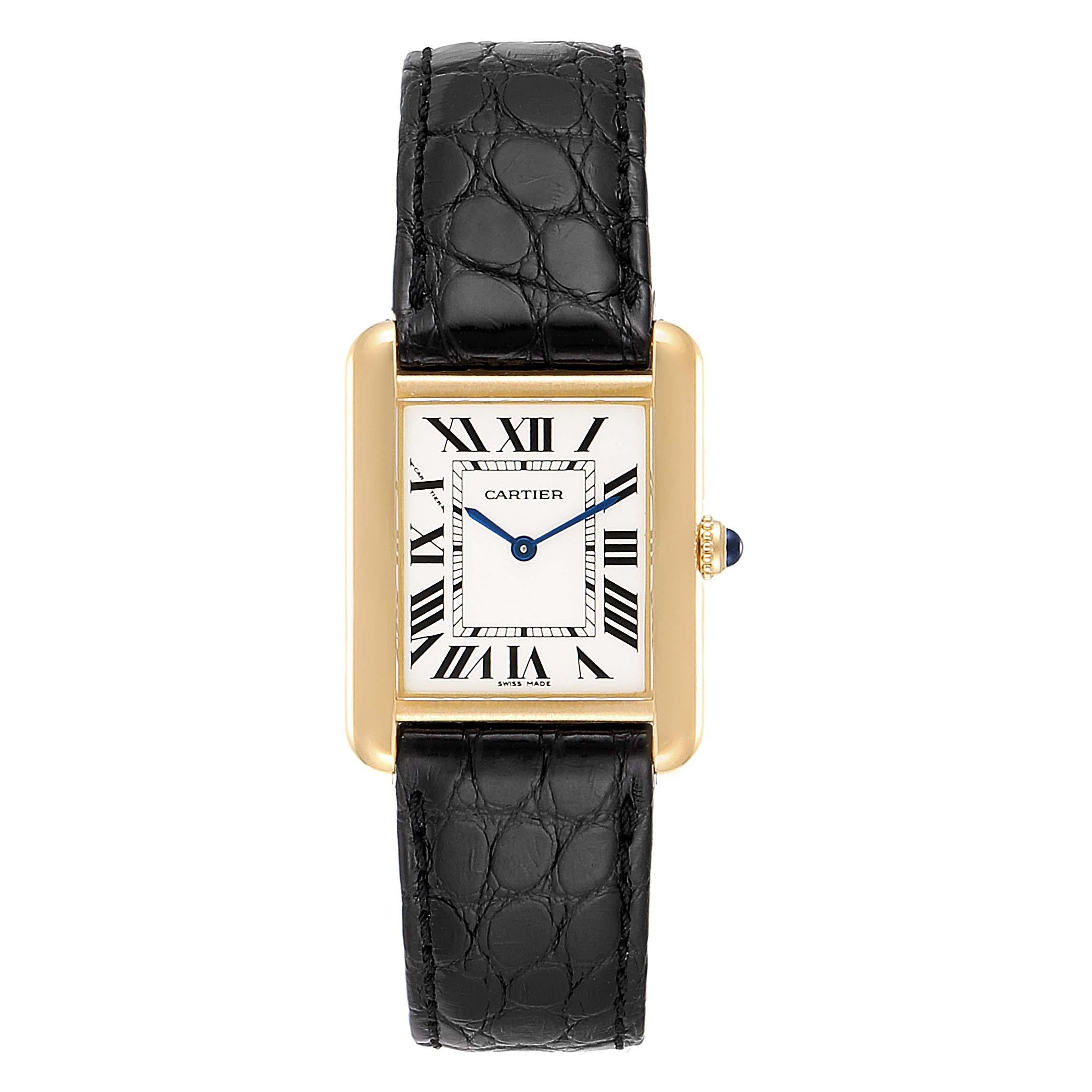 Cartier Tank Solo Yellow Gold Steel Black Strap Ladies Watch W1018755. Quartz movement. 18k yellow gold and steel back case 30.0 x 23.0 mm. Circular grained crown set with the blue spinel cabochon. . Scratch resistant sapphire crystal. Opaline