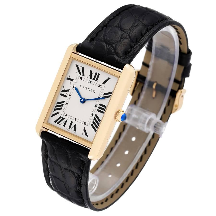 cartier tank black and gold