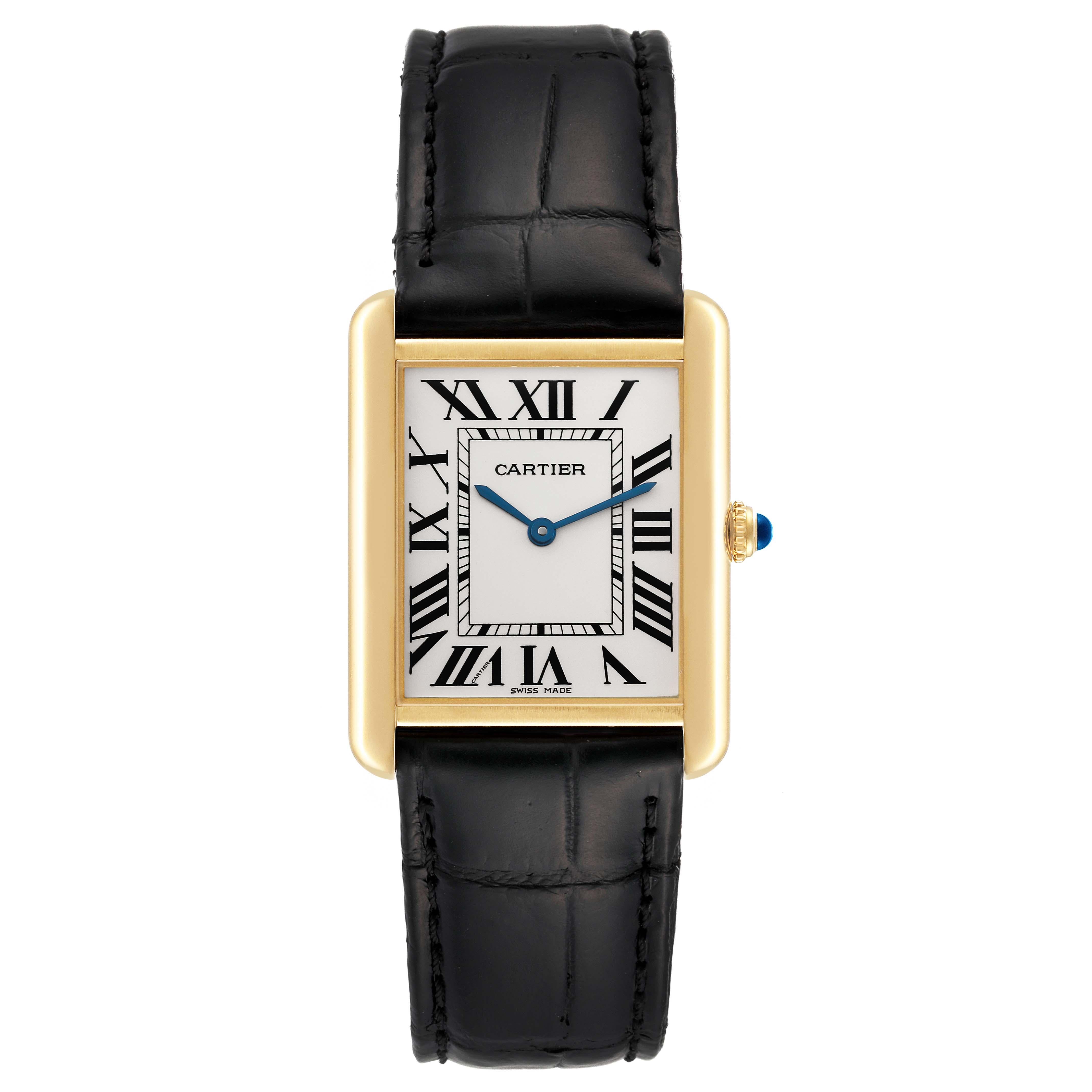 Cartier Tank Solo Yellow Gold Steel Black Strap Mens Watch W1018855. Quartz movement. 18k yellow gold/steel back case 34.0 x 27.0 mm. Circular grained crown set with a blue spinel cabochon. . Scratch resistant sapphire crystal. Silver opaline dial