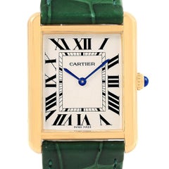 Cartier Montre Tank Solo unisexe en or jaune et acier avec bracelet vert W1018855