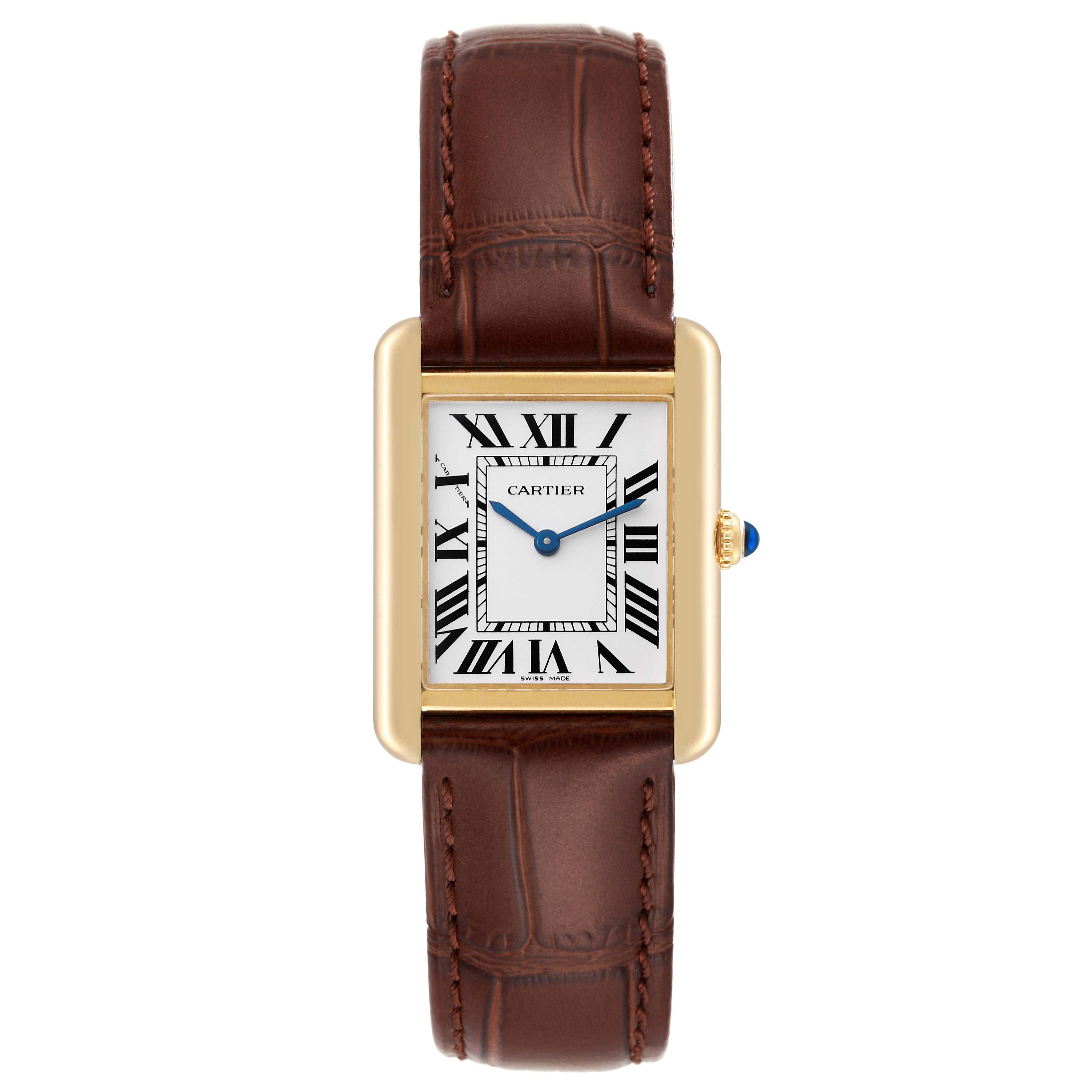 Cartier Tank Solo Yellow Gold Steel Silver Dial Ladies Watch W5200002 Card. Quartz movement. 18k yellow gold case 30.0 x 24.4 mm. Stainless steel caseback. Circular grained crown set with the blue spinel cabochon. . Scratch resistant sapphire