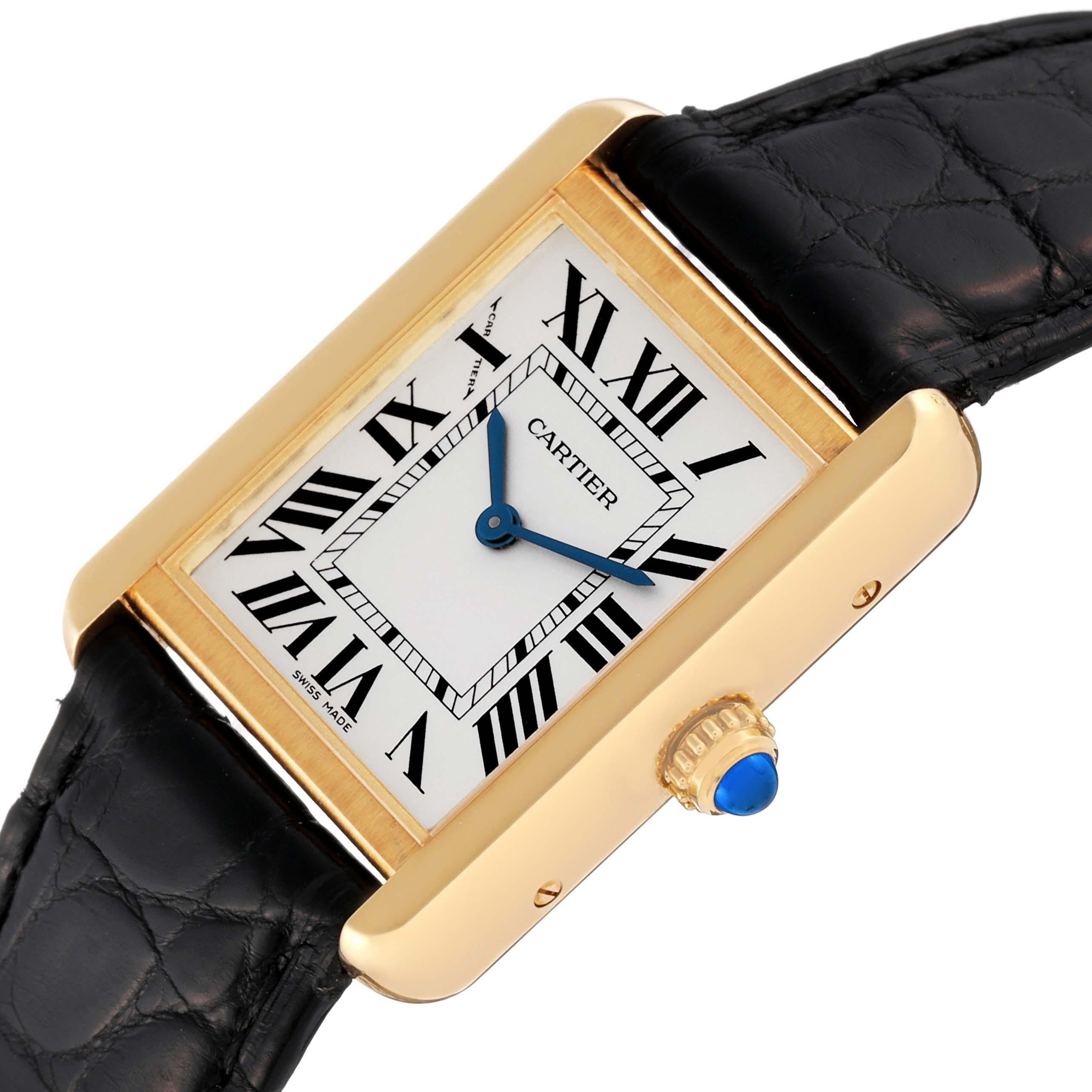 Cartier Tank Solo Yellow Gold Steel Silver Dial Ladies Watch W5200002 Card. Quartz movement. 18k yellow gold case 30.0 x 24.4 mm. Stainless steel caseback. Circular grained crown set with blue spinel cabochon. . Scratch resistant sapphire crystal.