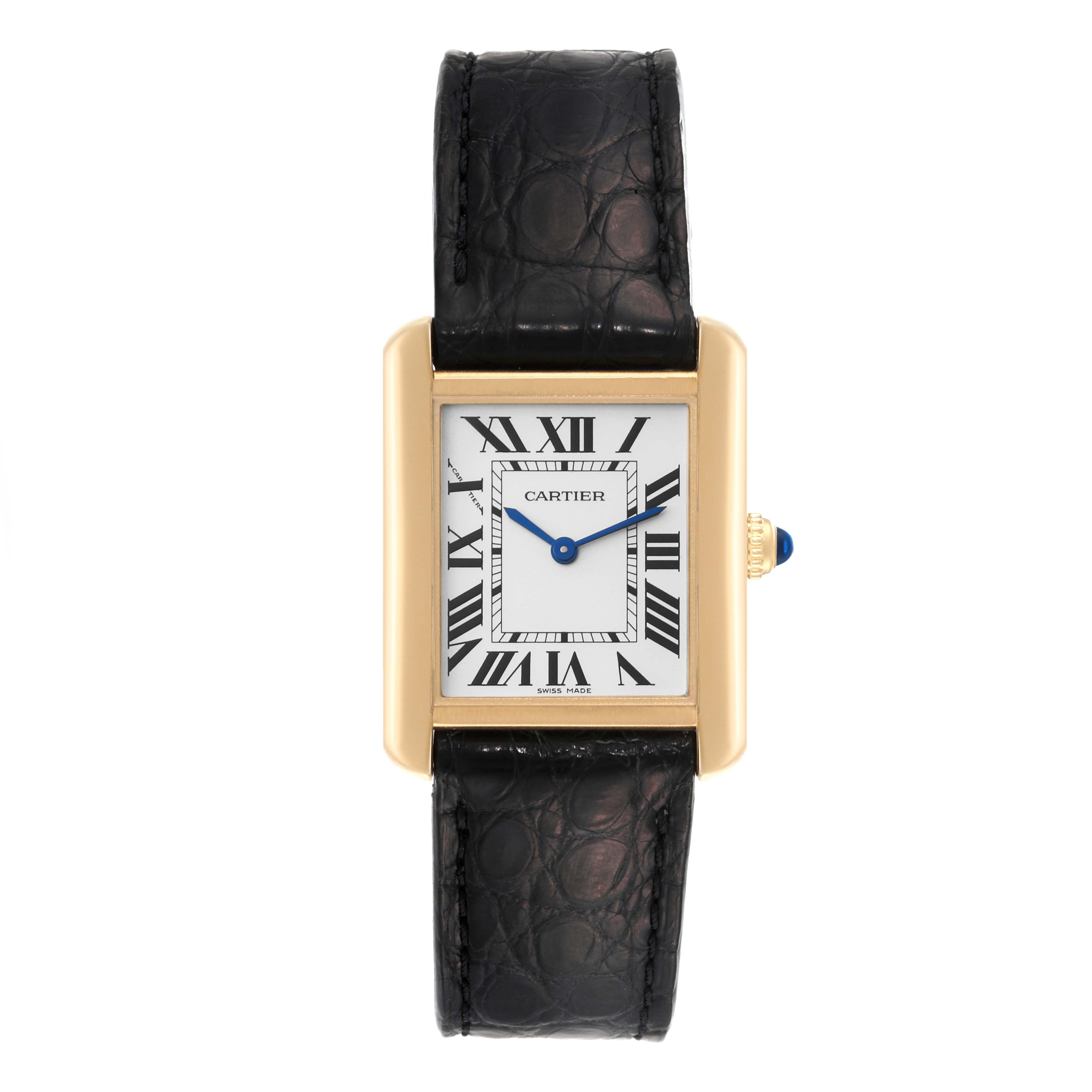 Cartier Tank Solo Yellow Gold Steel Silver Dial Ladies Watch W5200002 Papers. Quartz movement. 18k yellow gold case 30.0 x 24.4 mm. Stainless steel case back. Circular grained crown set with the blue spinel cabochon. . Scratch resistant sapphire