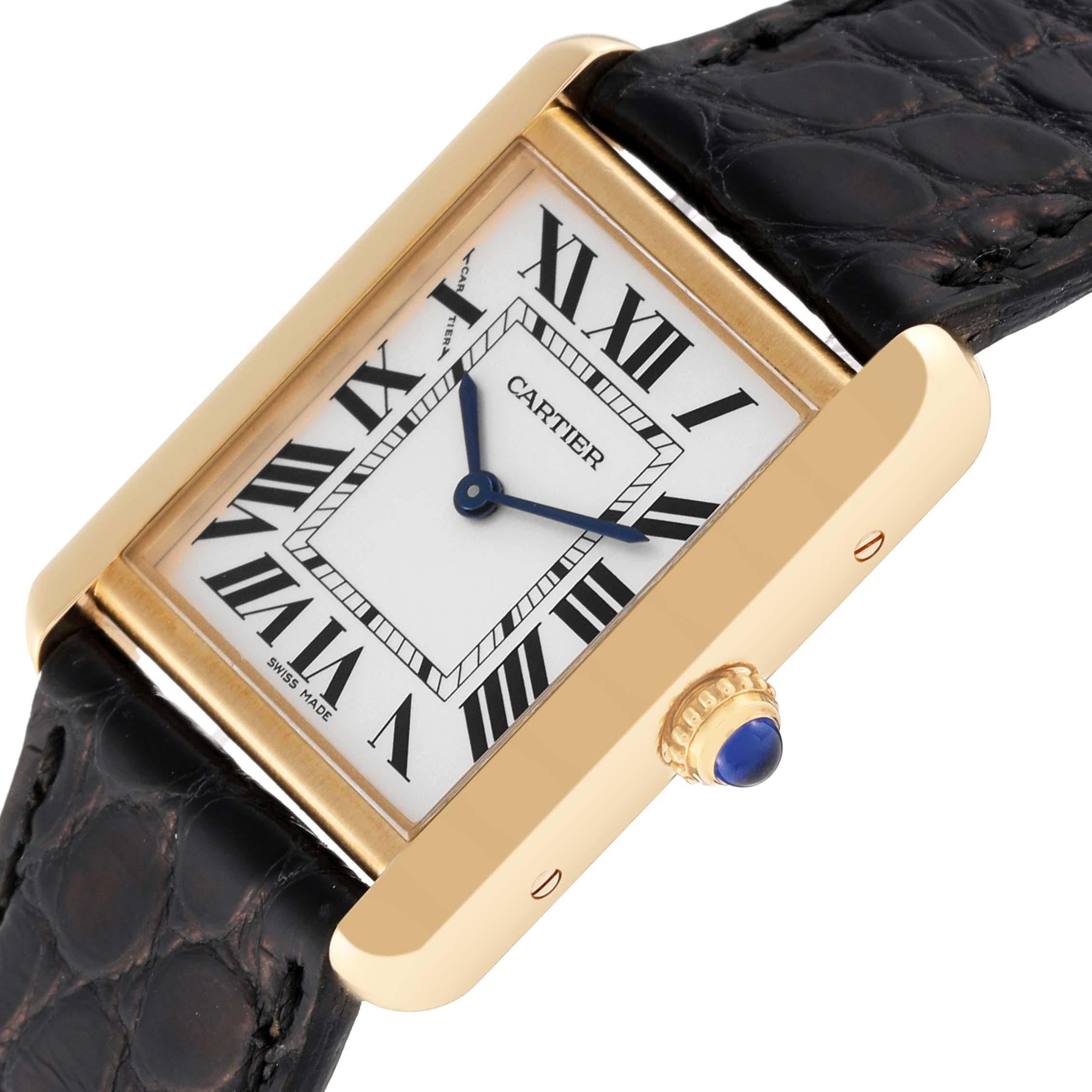Cartier Tank Solo Yellow Gold Steel Silver Dial Ladies Watch W5200002 Papers. Quartz movement. 18k yellow gold case 30.0 x 24.4 mm. Stainless steel caseback. Circular grained crown set with blue spinel cabochon. . Scratch resistant sapphire crystal.