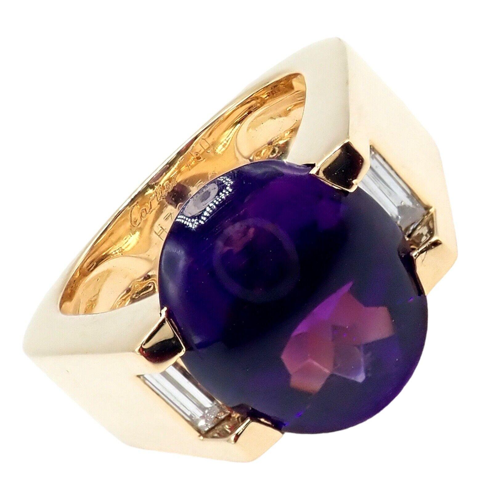 18k Yellow Gold Diamond Amethyst Tankissi Large Ring by Cartier.
The Cartier Tankissime 18k Yellow Gold Diamond Large Round Amethyst Ring boasts a striking large amethyst centerpiece, elegantly accented by sparkling diamonds. 
Set in luxurious 18k