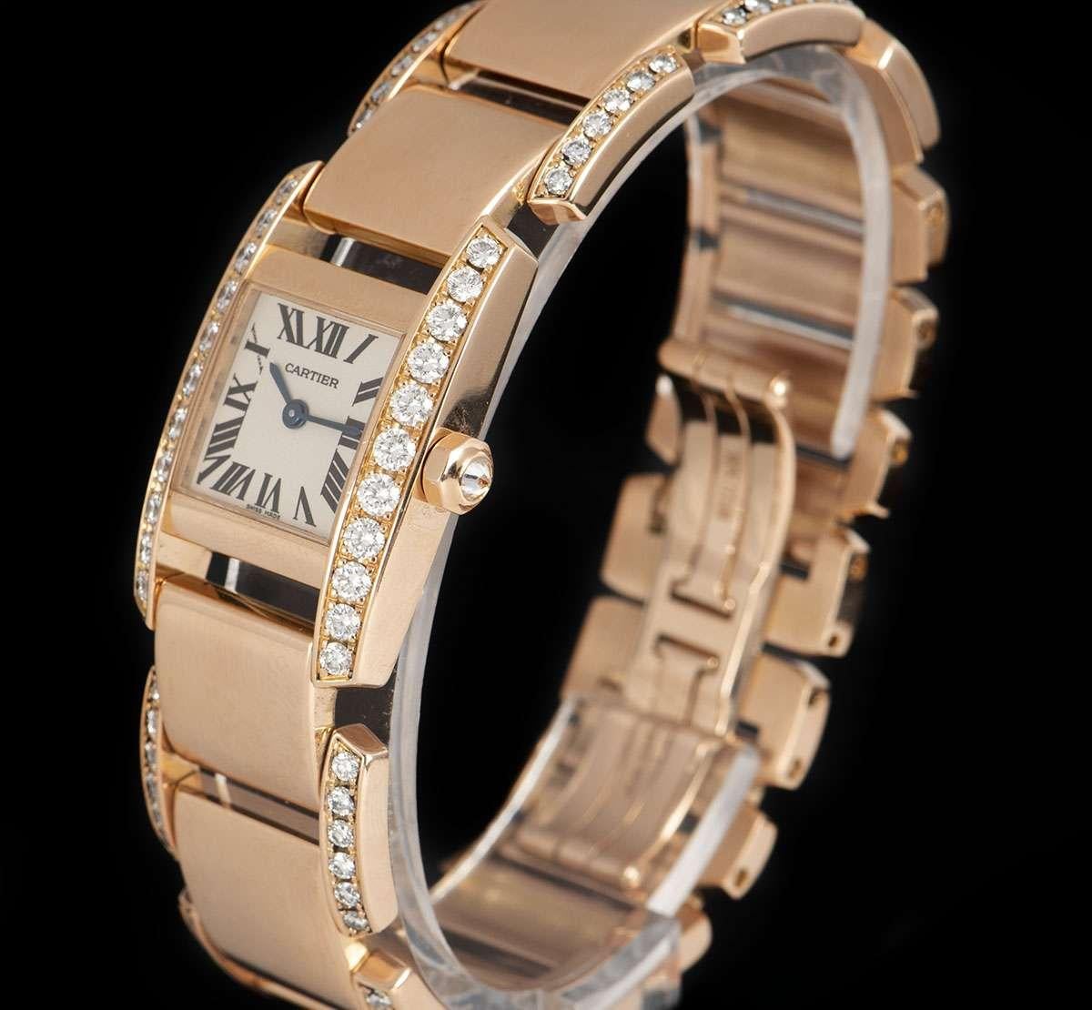 A 20 mm diamond set Tankissime women's wristwatch with a silver dial. 

Made from 18k rose gold, this luxury timepiece features a fixed bezel with 22 round brilliant cut diamonds, a single round brilliant cut diamond set to the crown and a gorgeous