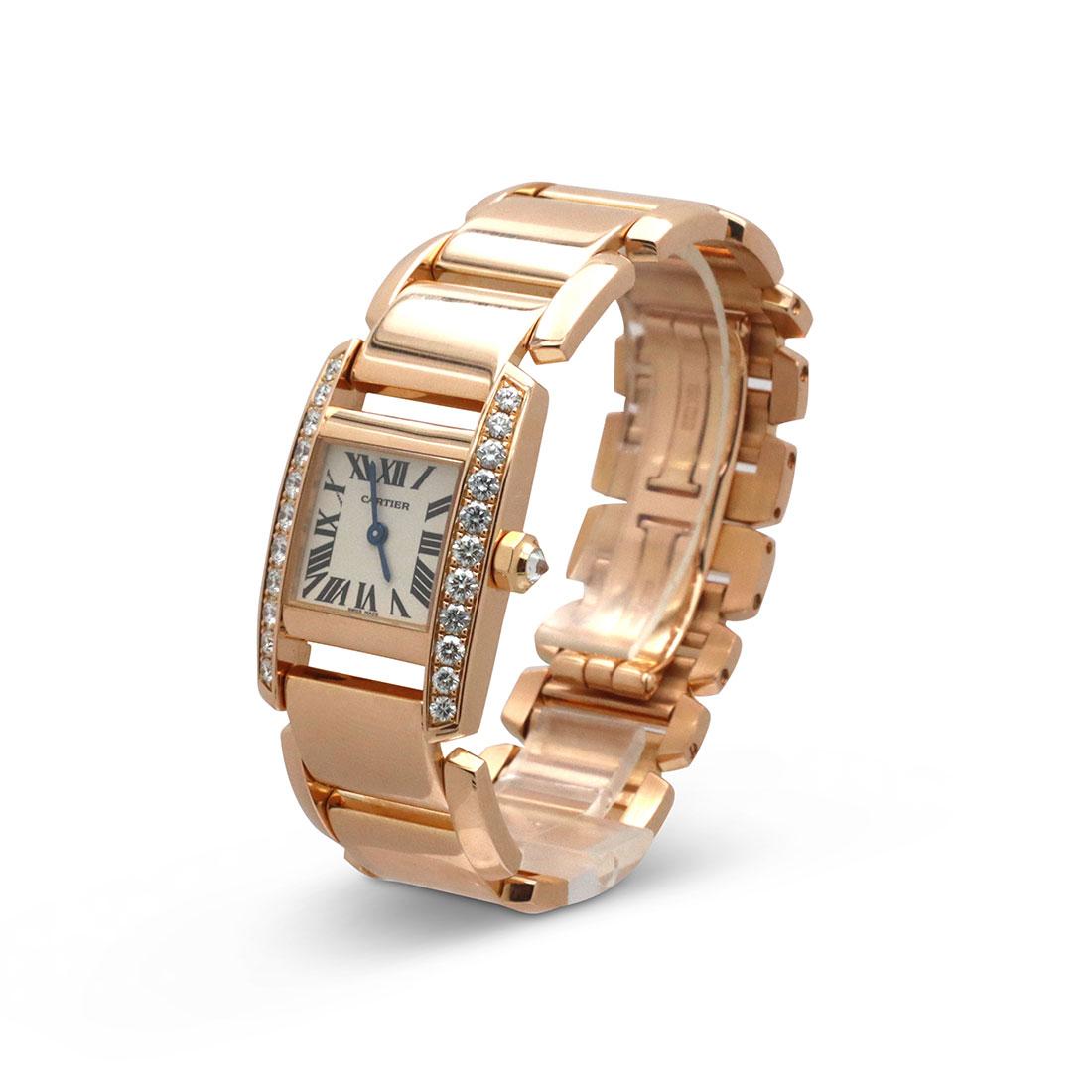 Authentic Cartier 'Tankissime' ladies watch crafted in 18 karat rose gold with diamond bezel.  The case measures 30mm x 20mm with a silvered dial and Roman Numeral hour markers and is accented by a diamond bezel and diamond-set crown.  The 18 karat