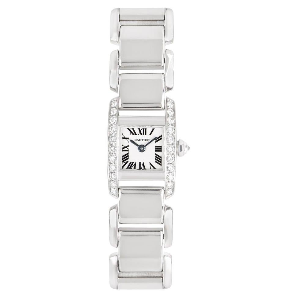 A 16 mm diamond set Tankissime women's wristwatch with a silver dial. 

Made from 18k white gold, this luxury timepiece features a fixed bezel with 22 round brilliant cut diamonds, a single round brilliant cut diamond set to the crown and a gorgeous