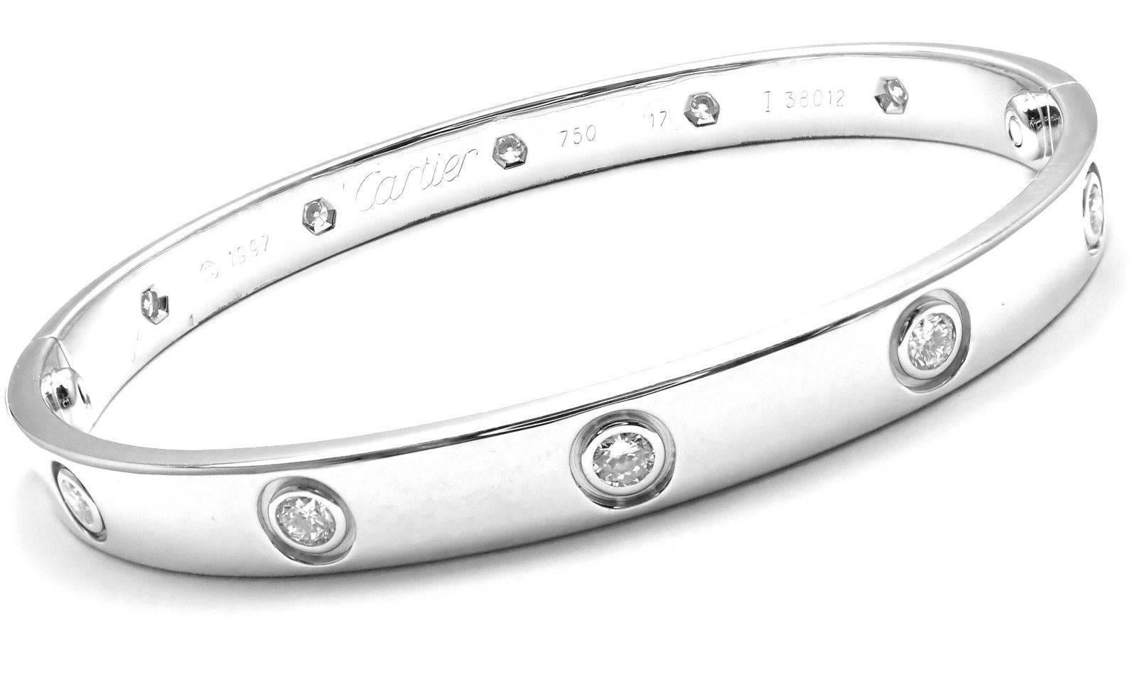 18k White Gold 10 Diamond Cartier LOVE Bangle Bracelet, size 17.
With 10 brilliant round cut diamonds, VS1 clarity, E-F color total weight approx. .50ct
This bracelet comes with a Cartier box, screwdriver and a Cartier certificate.
Details:
Size: