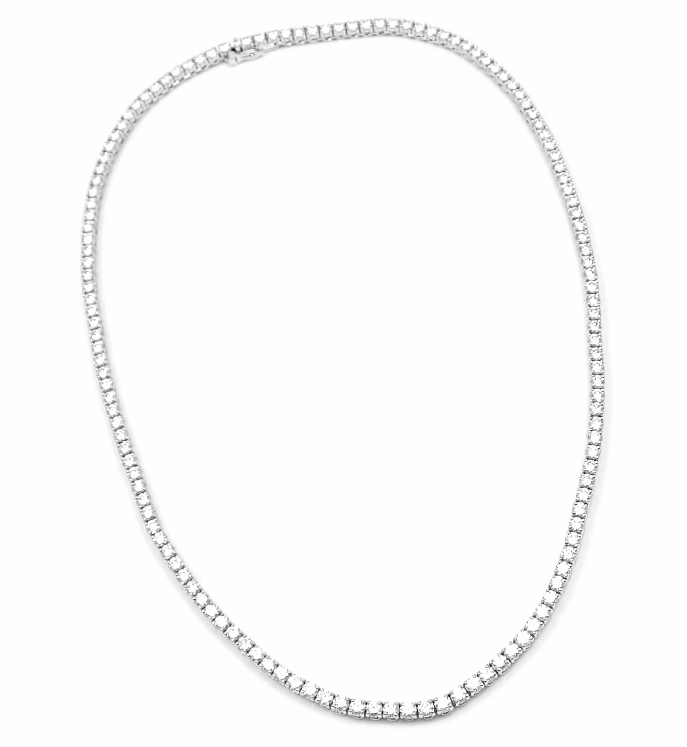 18k White Gold Diamond Line Tennis Necklace by Cartier. 
With 138 Round brilliant cut diamonds VVS1 clarity E color Total Diamond Weight approx. 9.66ct
This necklace comes with an original Cartier box and Cartier certificate.
Details: 
Chain Length:
