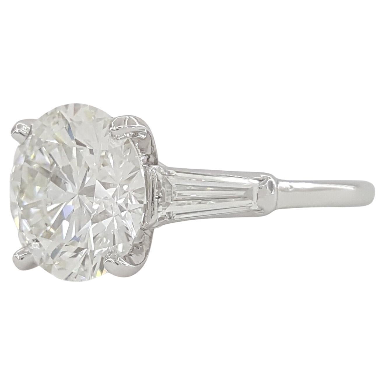 Modern Cartier Three 3-Stone Platinum Round Brilliant Cut Diamond Engagement Ring