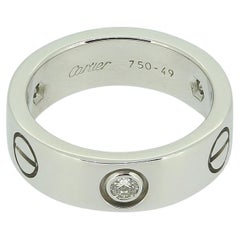 Cartier LOVE Ring mit drei Diamanten, Größe J (49)