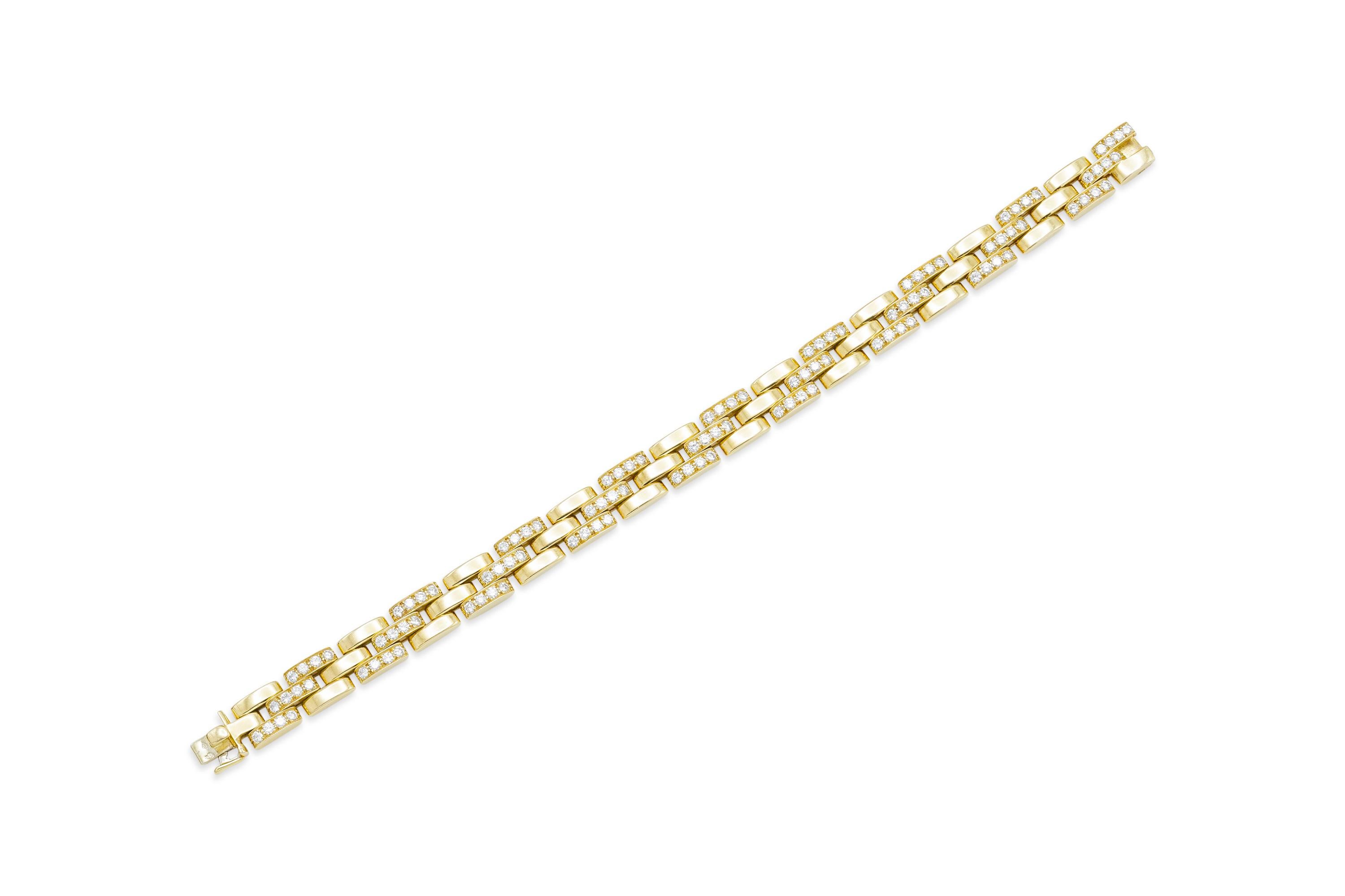 Finely crafted in 18K yellow gold featuring 2.79 carats of round-brilliant cut diamonds on alternating maillon links. 
Size 7 1/4 inches.
Signed and numbered by Cartier, from their Panthere collection.
Comes with Cartier certificate.
Matching