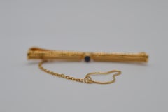 Cartier Tie Clip in 18K Yellow Gold with Cabbochon Sapphire Unworn